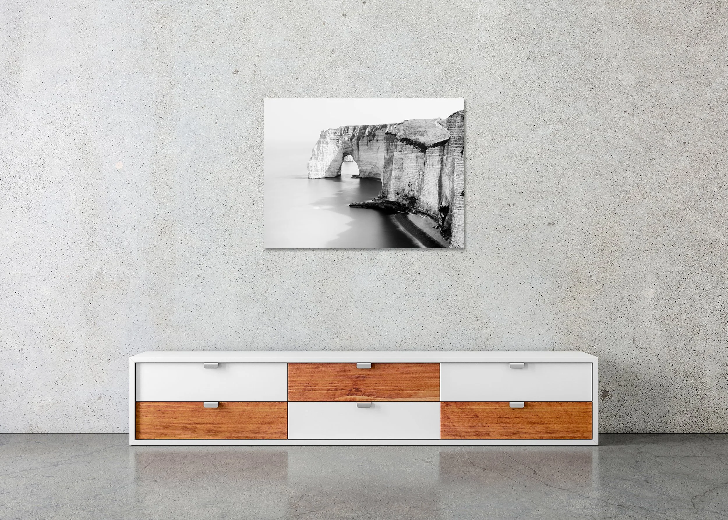 Alabaster Coast, Study 2 – frameless black-and-white photograph on aluminium Dibond displayed above a low cabinet.