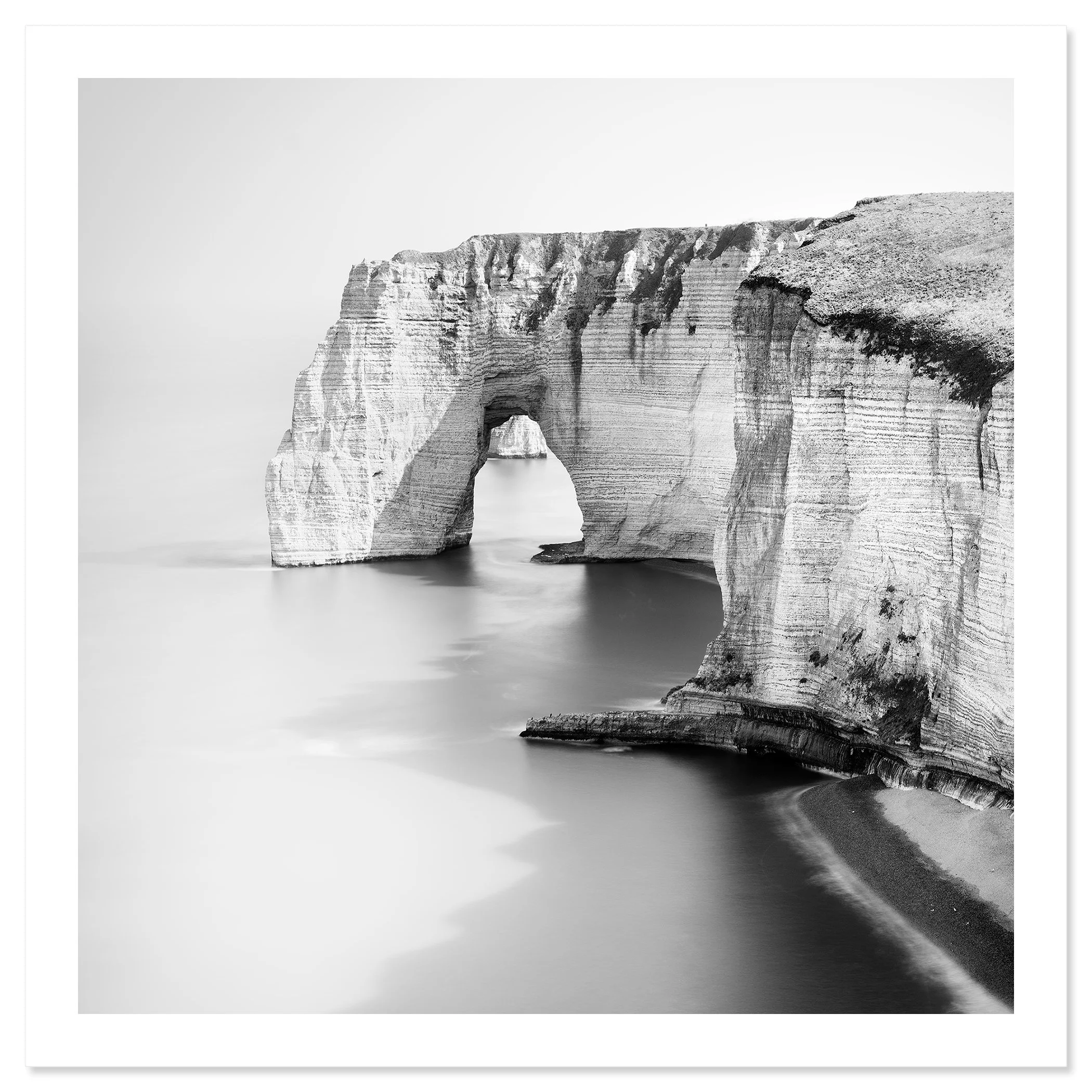 Alabaster Coast Study 1 by Gerald Berghammer, black-and-white archival fine art print with white border showing the chalk cliffs of Étretat, France.