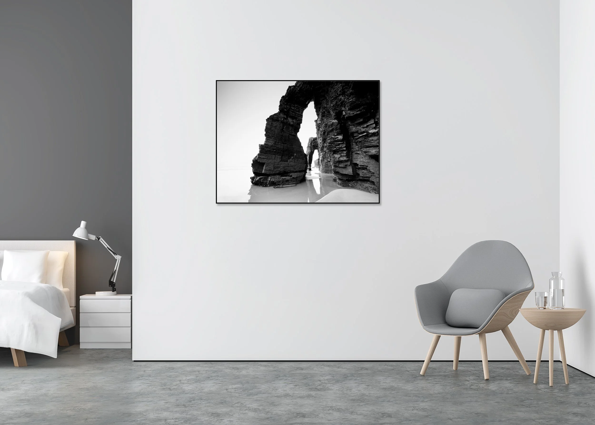 Fine art black and white seascape photo of rock arch formations on the beach, reflected in tidal water, mounted to Dibond in an aluminium ArtBox.