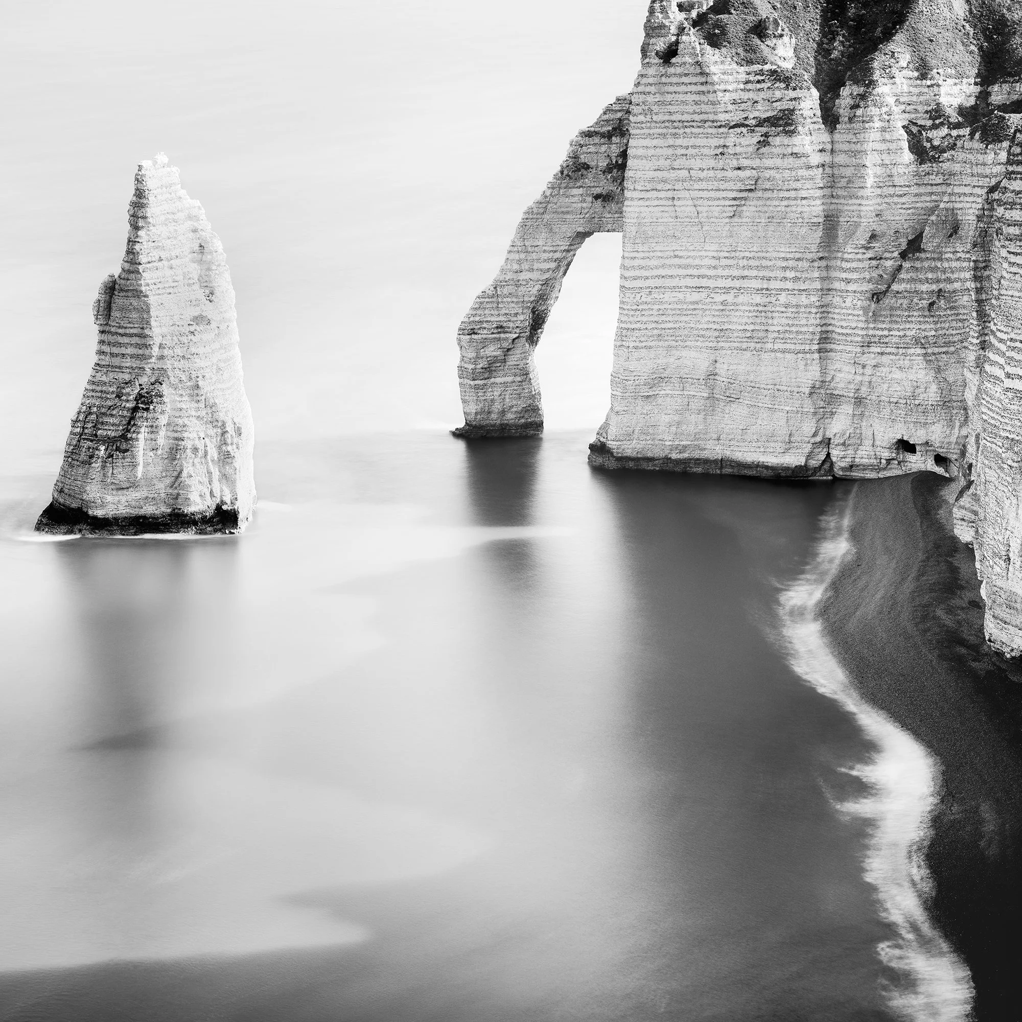 Detail of The Cliffs of Étretat, Study 3 by Gerald Berghammer, showing the chalk sea arch, Aiguille rock needle and smooth long-exposure water in Normandy.
