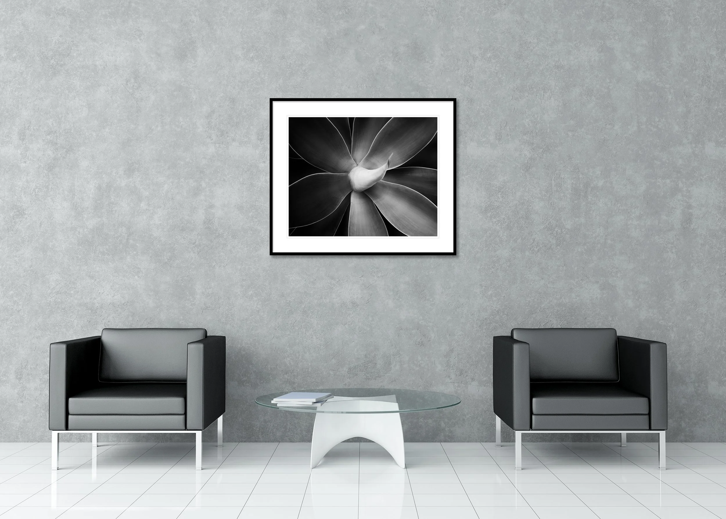 Abstract black-and-white flower macro with layered petals and soft tonal gradients, archival pigment print in a classic frame with a mount.