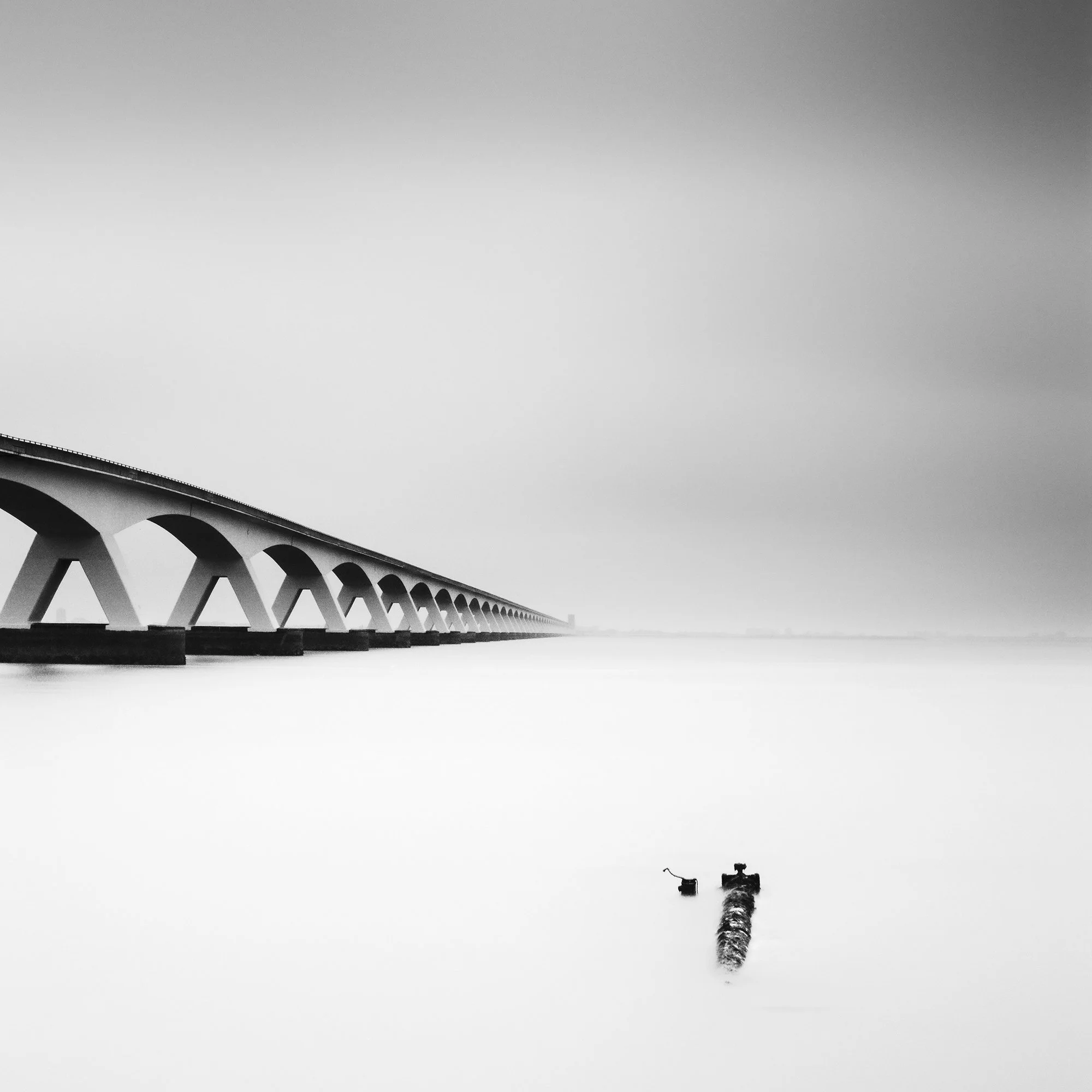 Detail of Zeeland Bridge Study 1 showing the repeating bridge arches fading into mist by Gerald Berghammer.