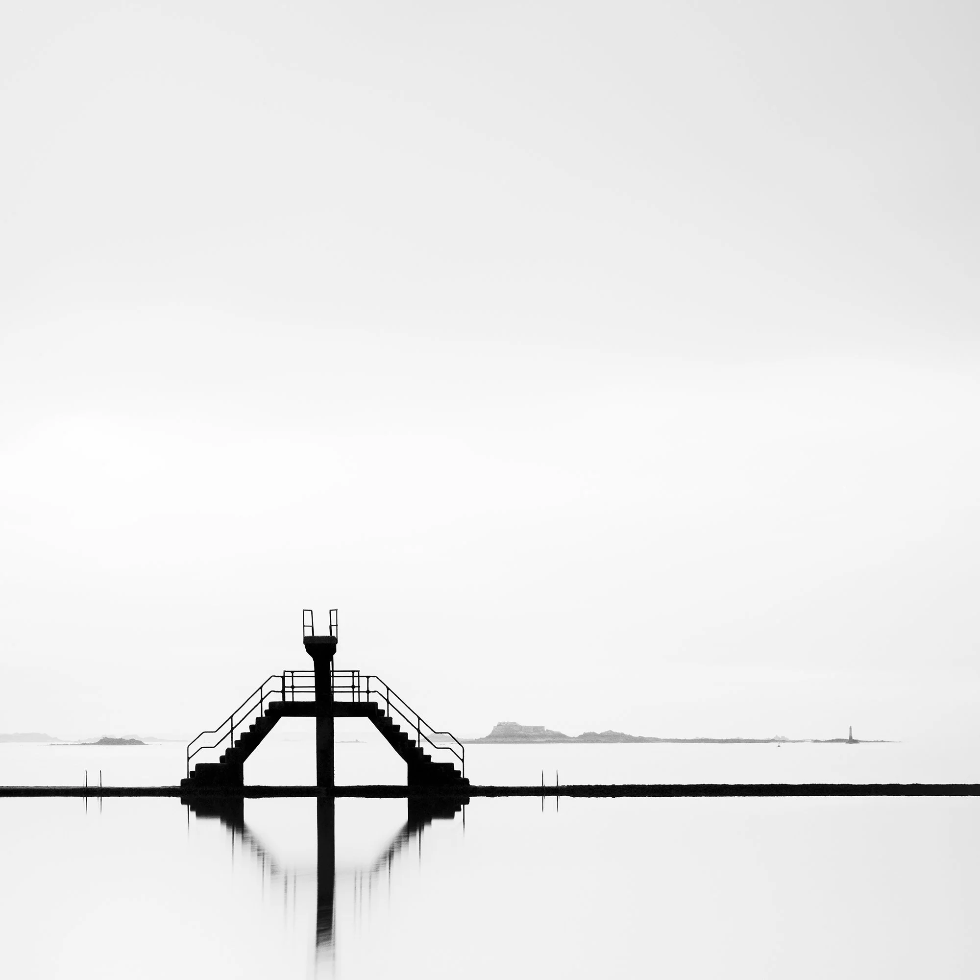 Diving Platform Study 2 – detail of the minimalist diving platform and calm seawater in France by Gerald Berghammer.