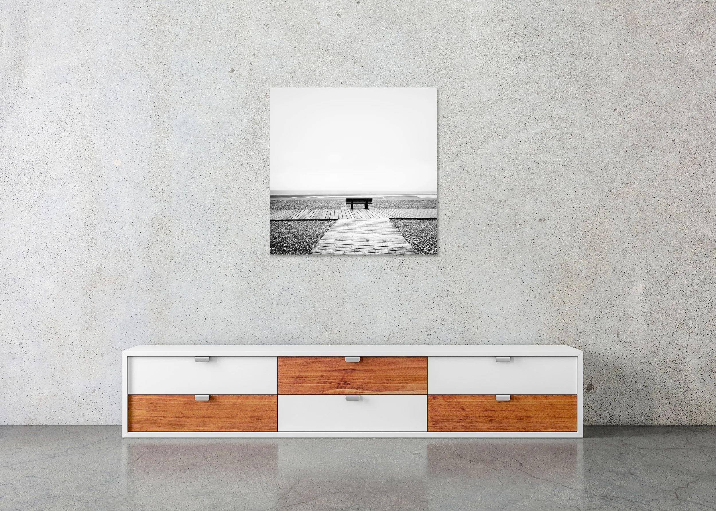 Black-and-white seascape with a bench on a wooden path overlooking the Atlantic Ocean and a rocky beach, ChromaLuxe metal print frameless