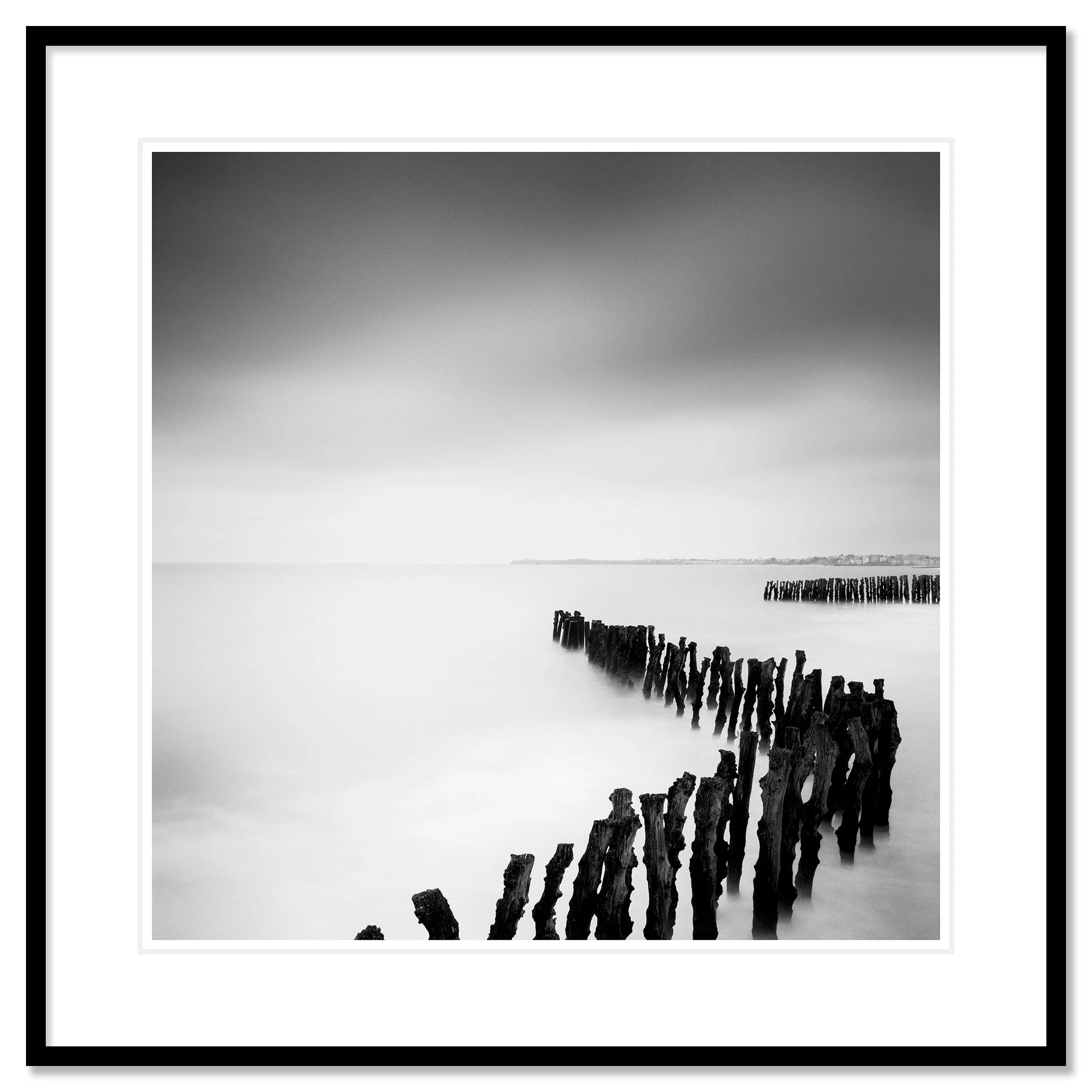 Sea Breakers black-and-white fine art print in a black aluminium frame with a white mount by Gerald Berghammer.