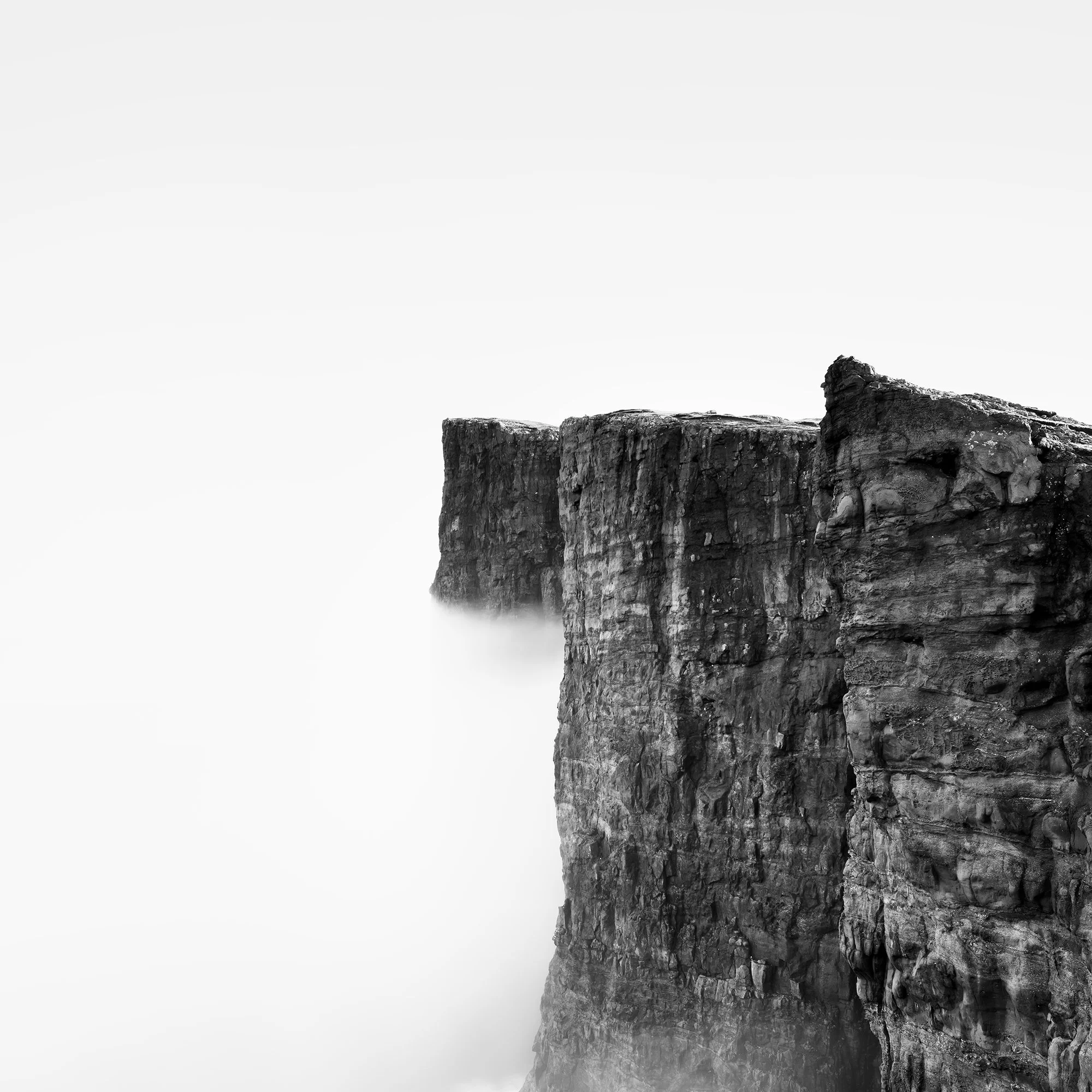 Foggy Slave Cliff Study 3 by Gerald Berghammer, detail of sheer basalt cliffs fading into dense sea mist in the Faroe Islands.