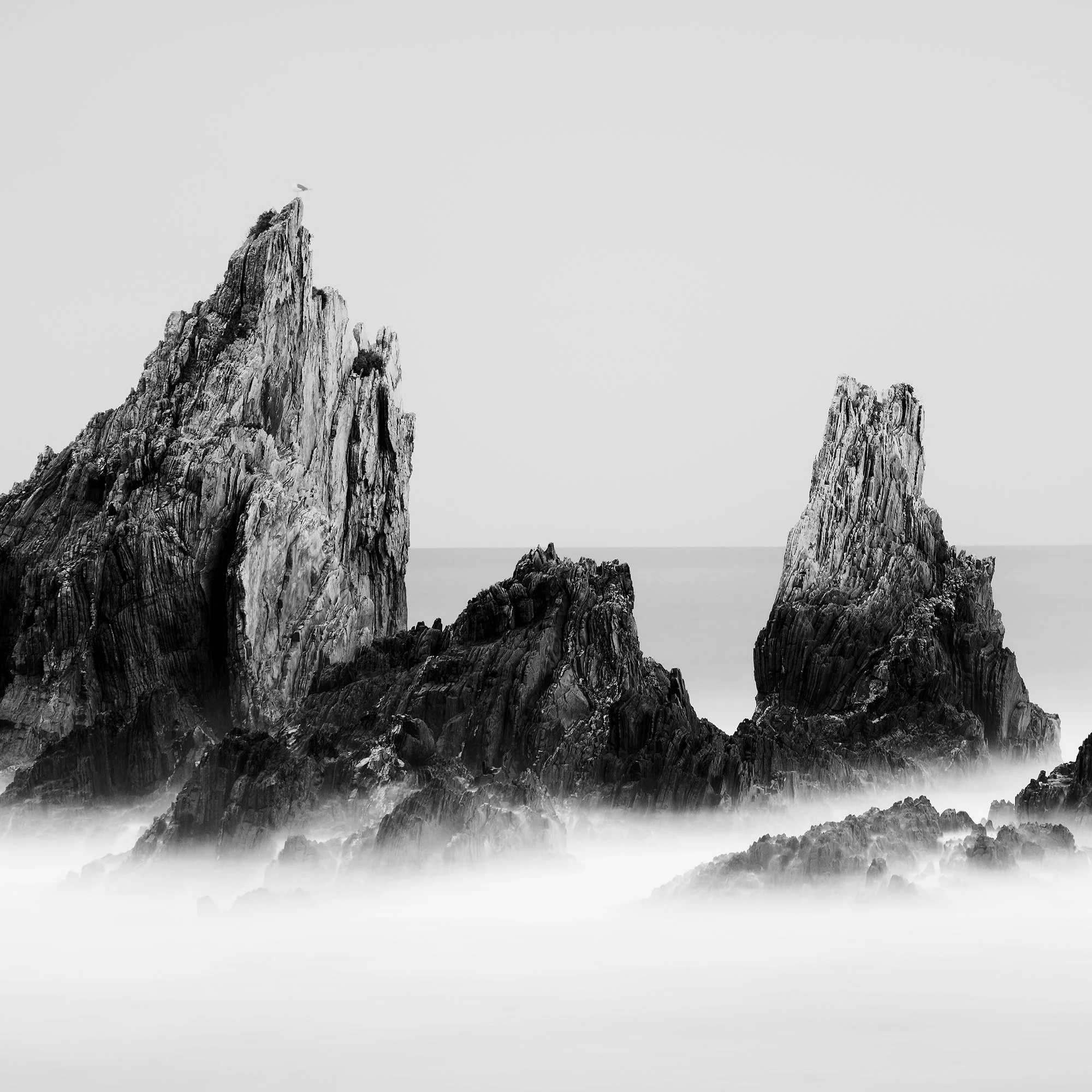 Close-up detail of Rocky Peaks Study 1 by Gerald Berghammer, minimalist black-and-white seascape of rocky peaks in Spain.