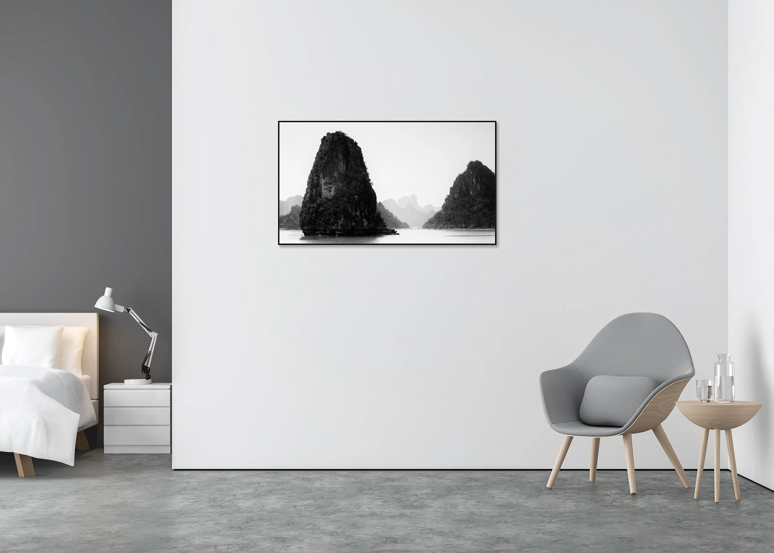 Black-and-white photo print of misty limestone karsts in Ha Long Bay, Vietnam, on calm water, mounted to Dibond in an aluminium ArtBox.