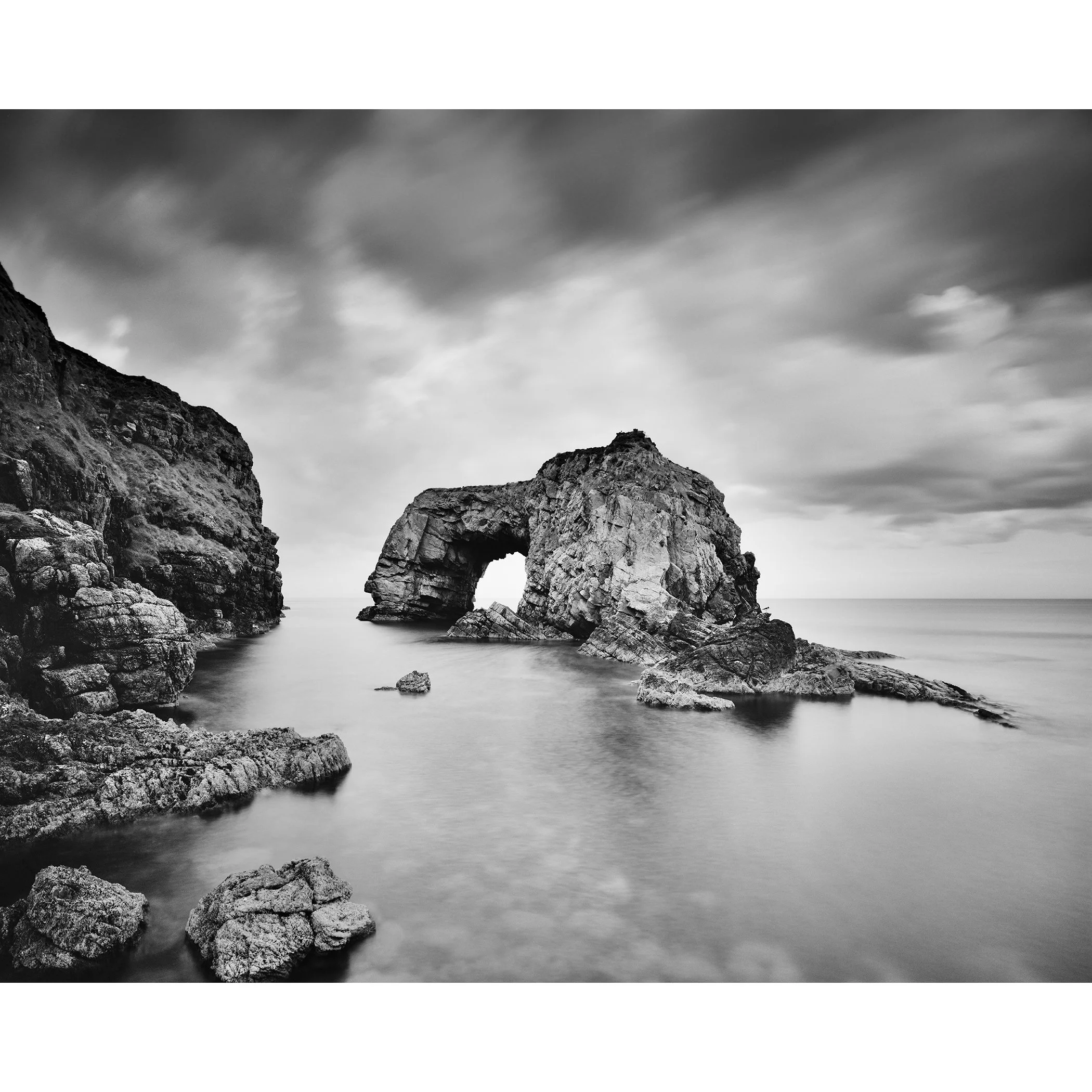 Great Pollet Sea Arch Study 3, black-and-white long-exposure seascape on the Fanad Peninsula, Ireland, by Gerald Berghammer.