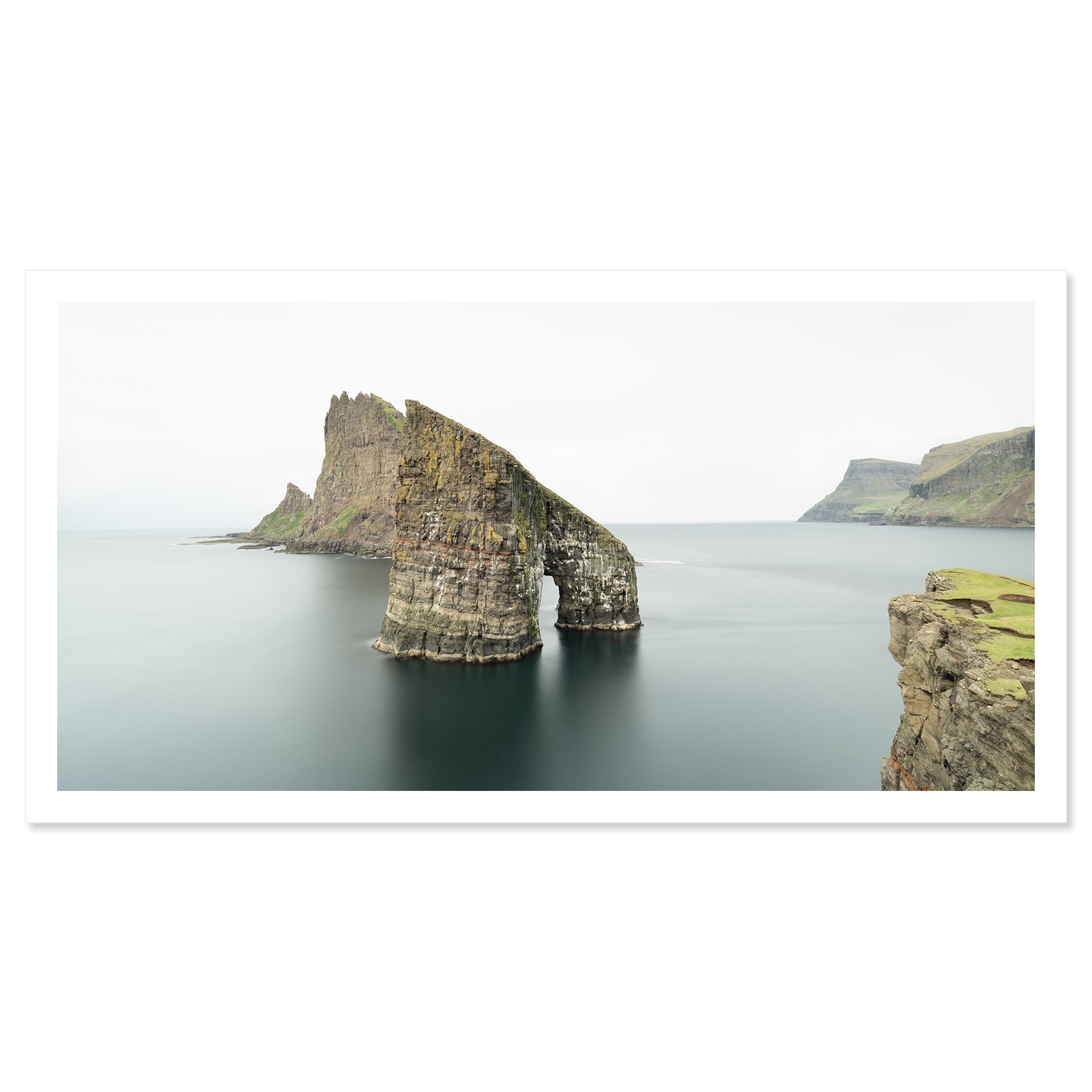 Gerald Berghammer - Color seascape panorama photography. Cliffs and sea stacks along a coastline under an overcast sky. Fine art print only