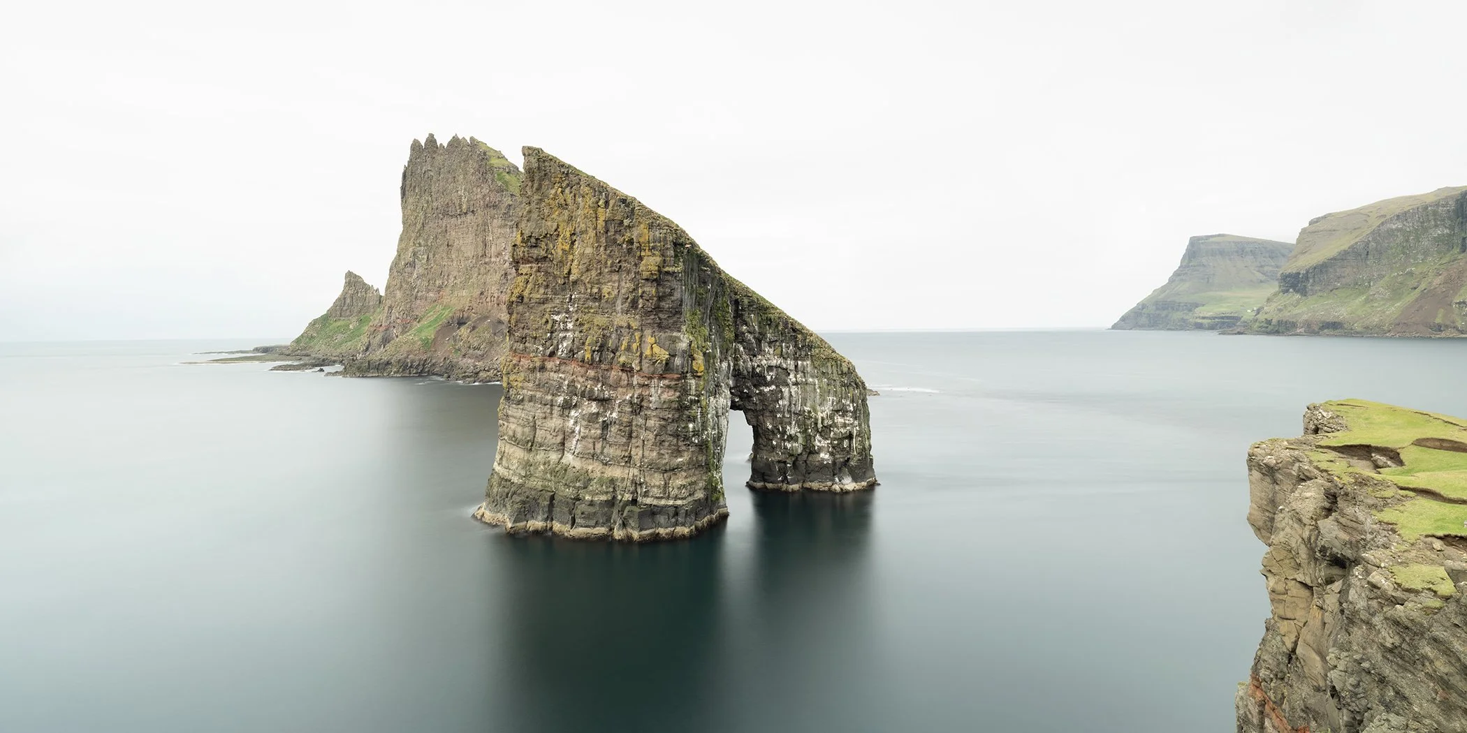 Drangarnir rock formation rising from the North Atlantic near Vágar, Faroe Islands. Photo by Gerald Berghammer.