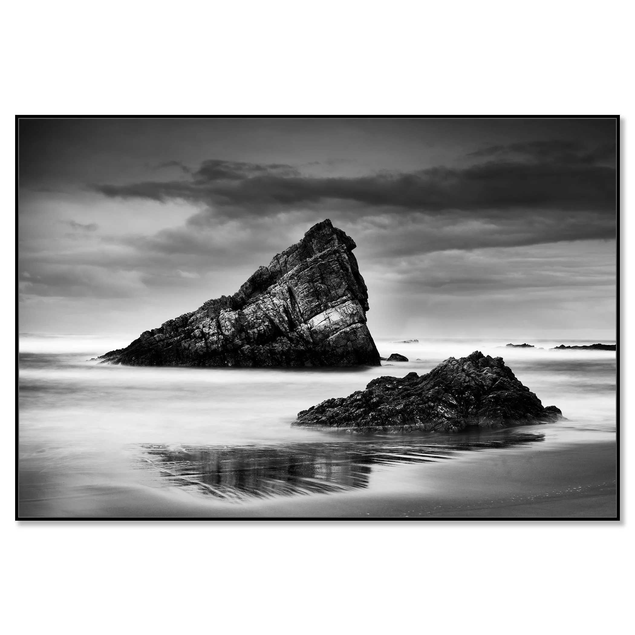 Black and white photograph of shoreline rocks on the Bay of Biscay, Spain – framed ArtBox black