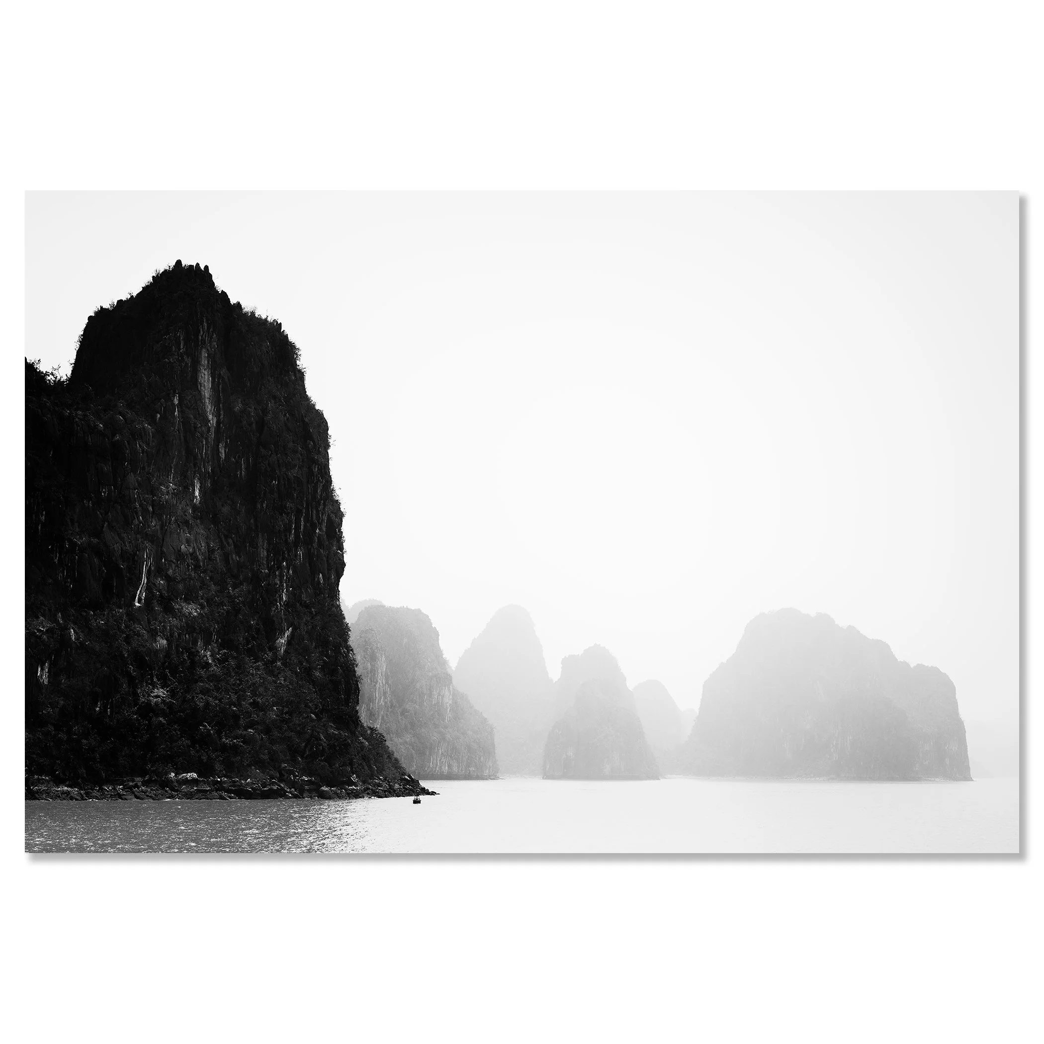 Dramatic seascape with limestone karst islands emerging from the water under a hazy, overcast sky – dibond frameless