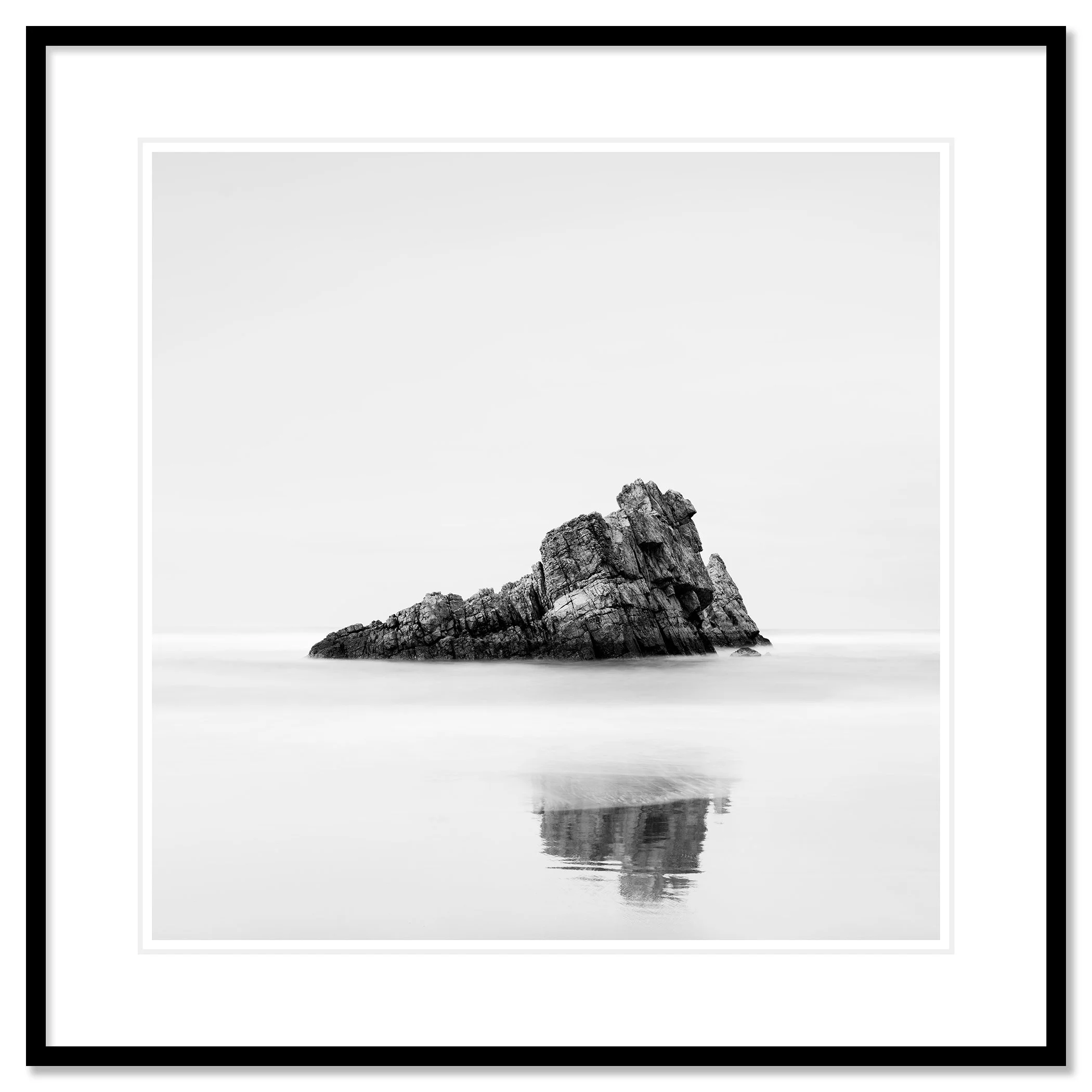 Rock on the Beach, Study 1 – archival pigment print in a black aluminium frame with a white mount by Gerald Berghammer.
