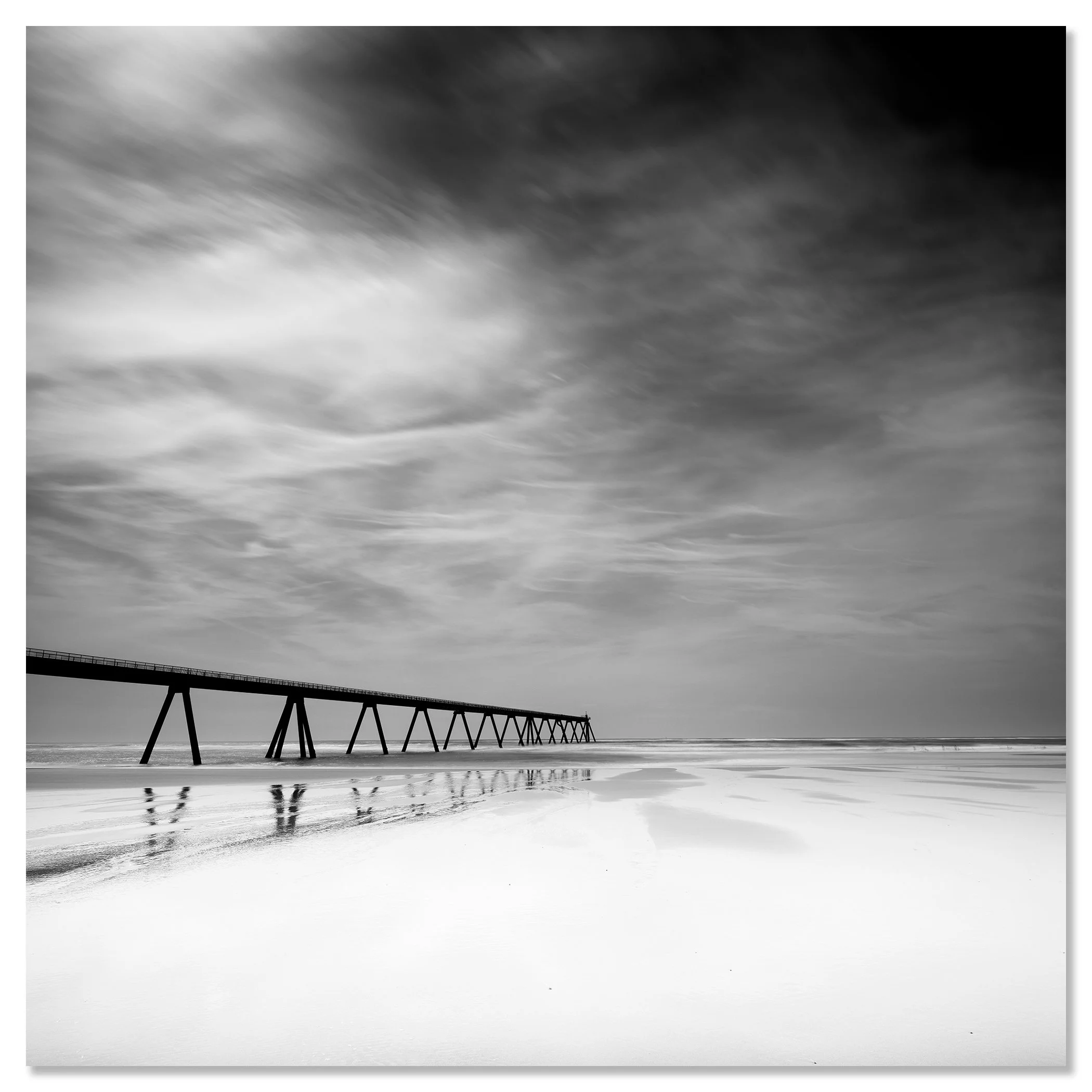 Black-and-white coastal photograph of Wharf de la Salie, France, mounted on frameless Dibond
