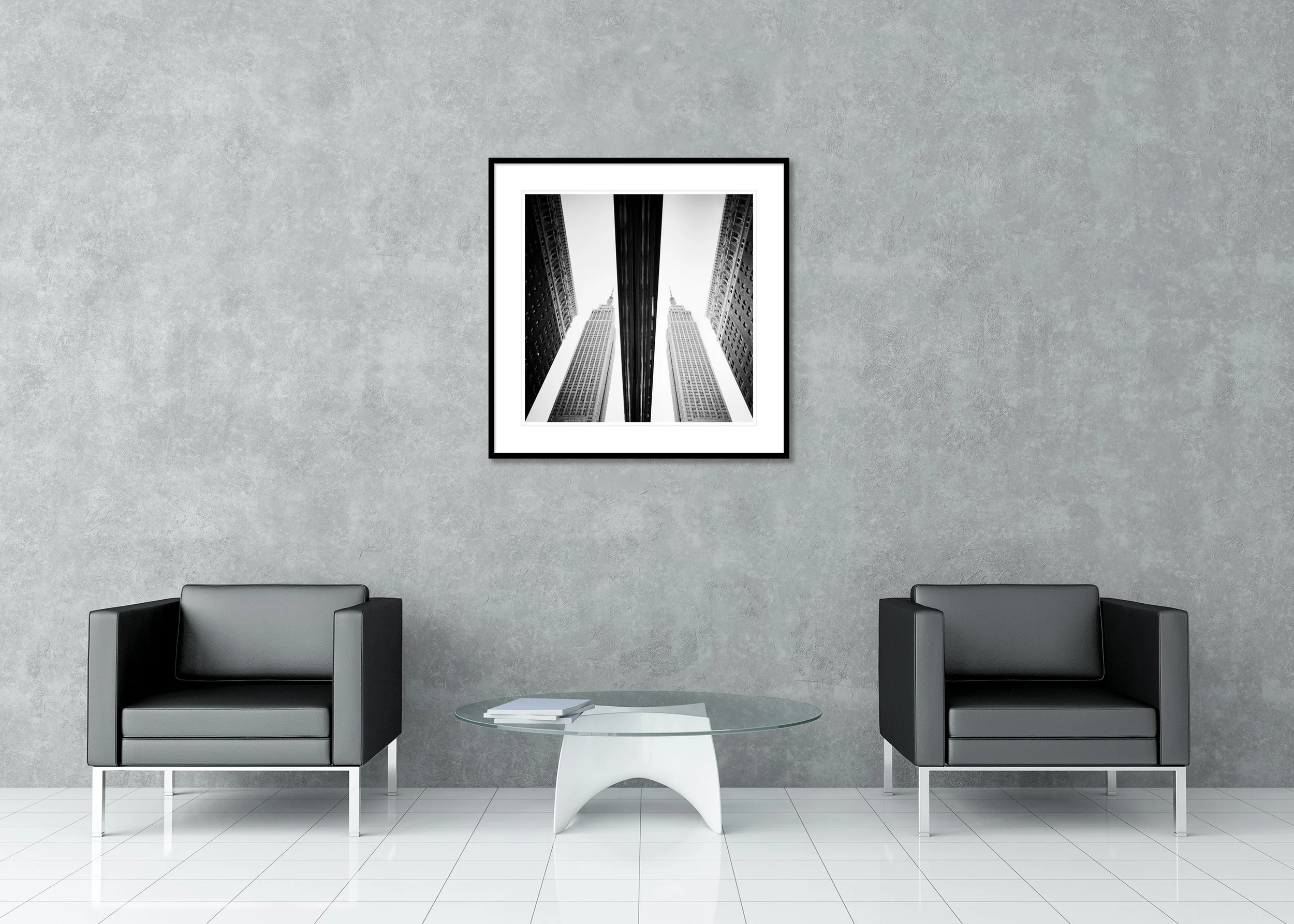 Empire State Building Study 2 displayed in a modern interior as an archival pigment print in a black aluminium frame with a white mount. Photo by Gerald Berghammer.