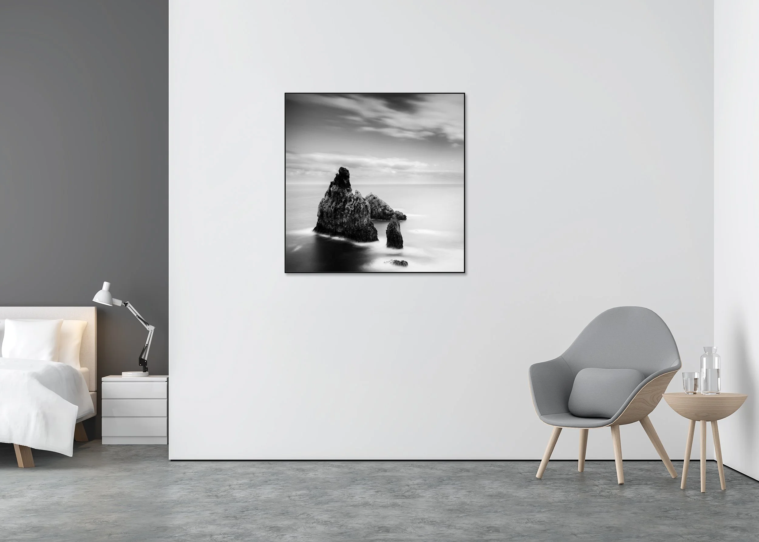 Black-and-white long-exposure photo of rugged sea stacks in a misty ocean under a soft clouded sky, mounted on Dibond aluminium ArtBox.