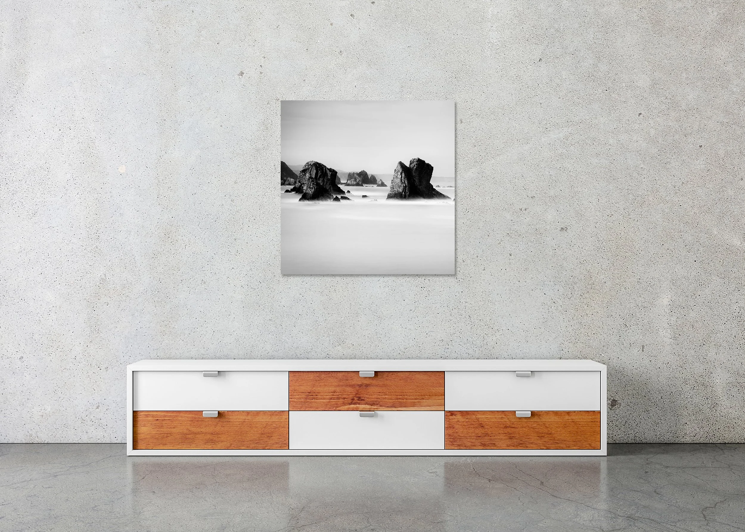 Playa del Silencio Study 2 displayed in a modern interior as a frameless black-and-white artwork mounted on aluminium Dibond. Photo by Gerald Berghammer.