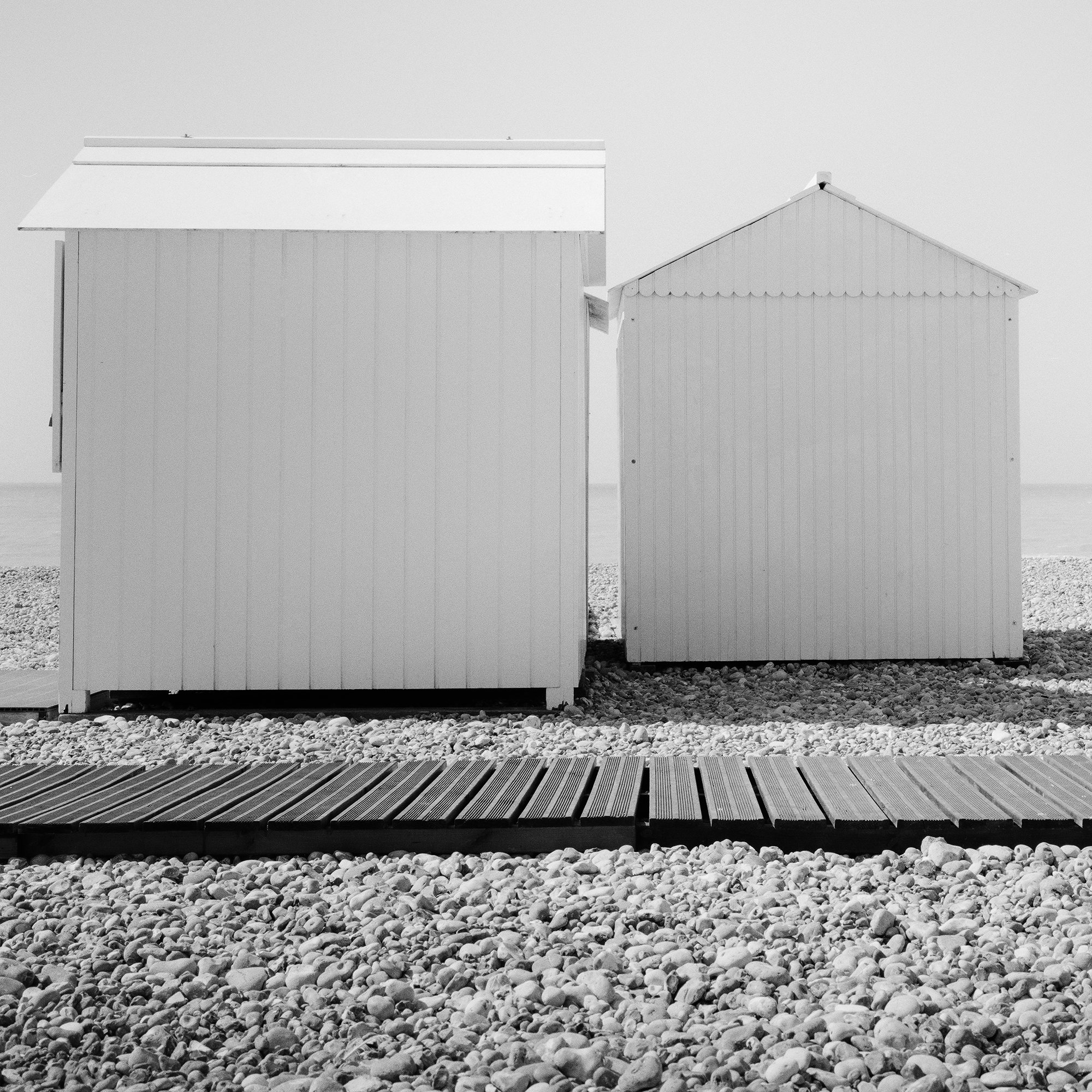 Detail view of Esplanade Study 2 by Gerald Berghammer, a minimalist black-and-white coastal photograph from France.