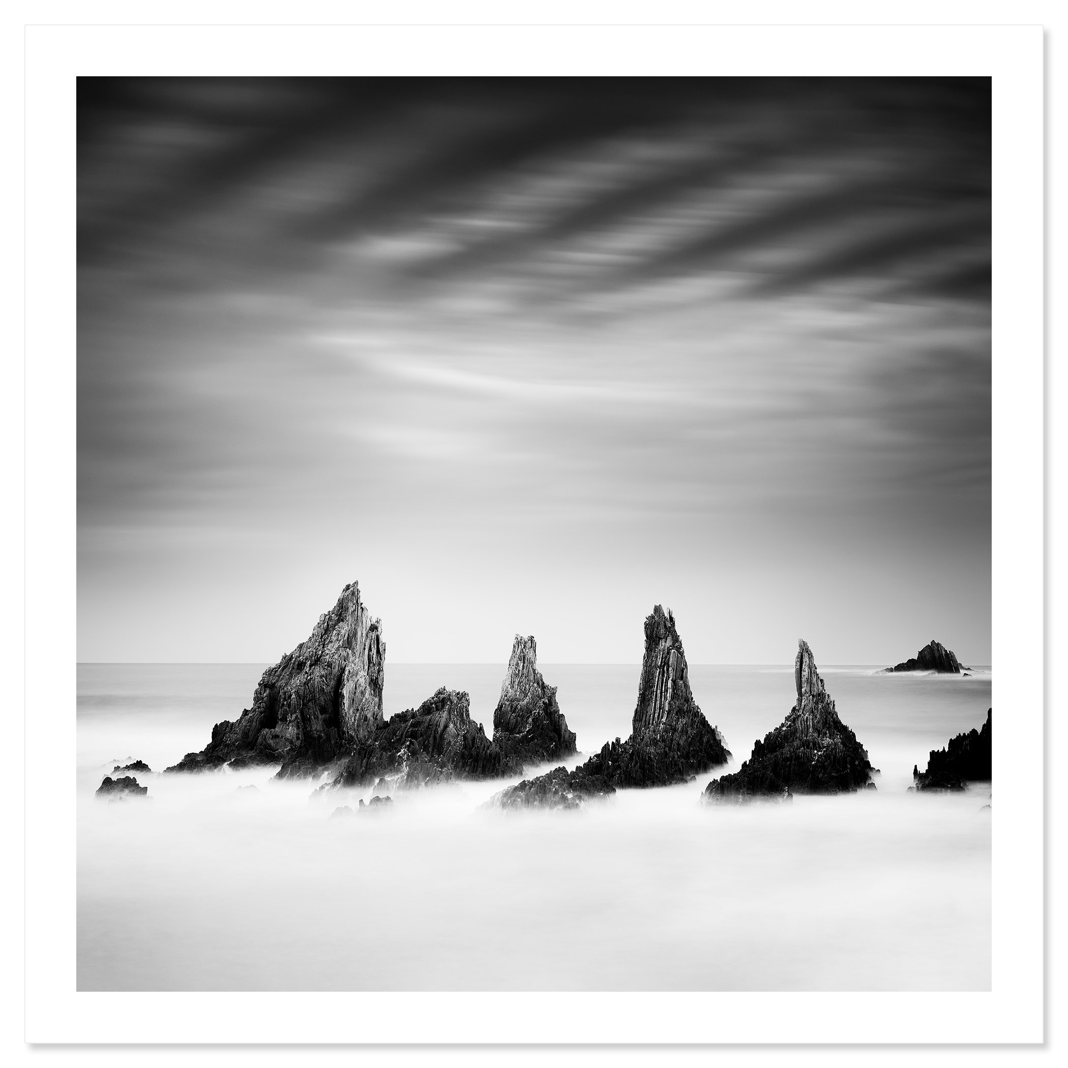 Rocky Peaks Study 4 – Spain, black-and-white seascape print with white border on baryta paper