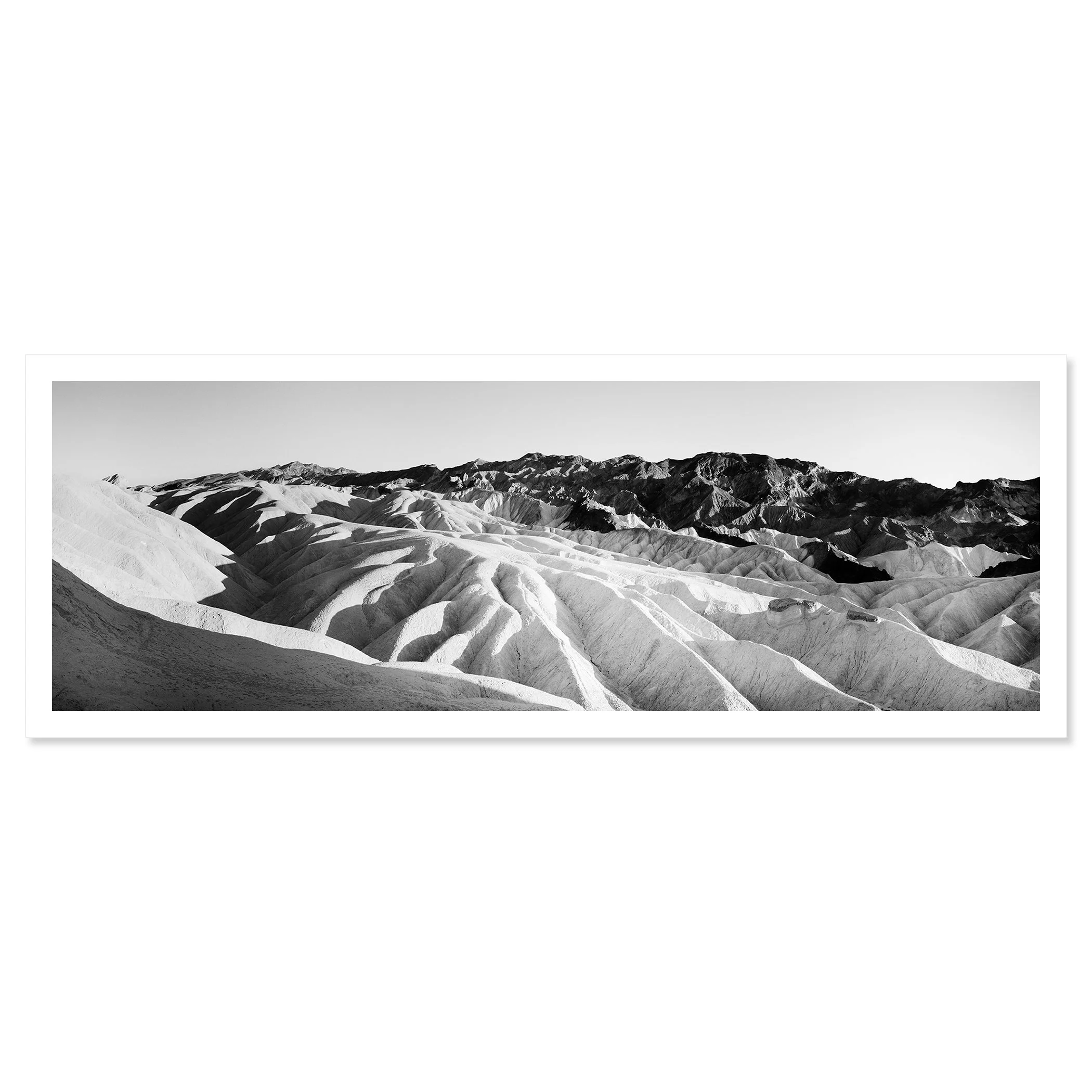 Gerald Berghammer - Analog panorama photography. Black and white photo of rugged desert landscape with mountainous terrain with deep valleys and ridges. Fine art print only