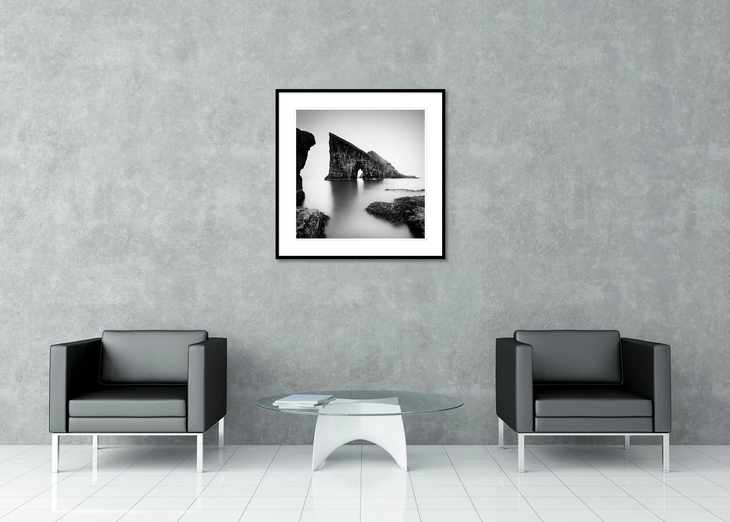 Black and white long-exposure sea arch photo, archival pigment print in a classic frame with a mount.