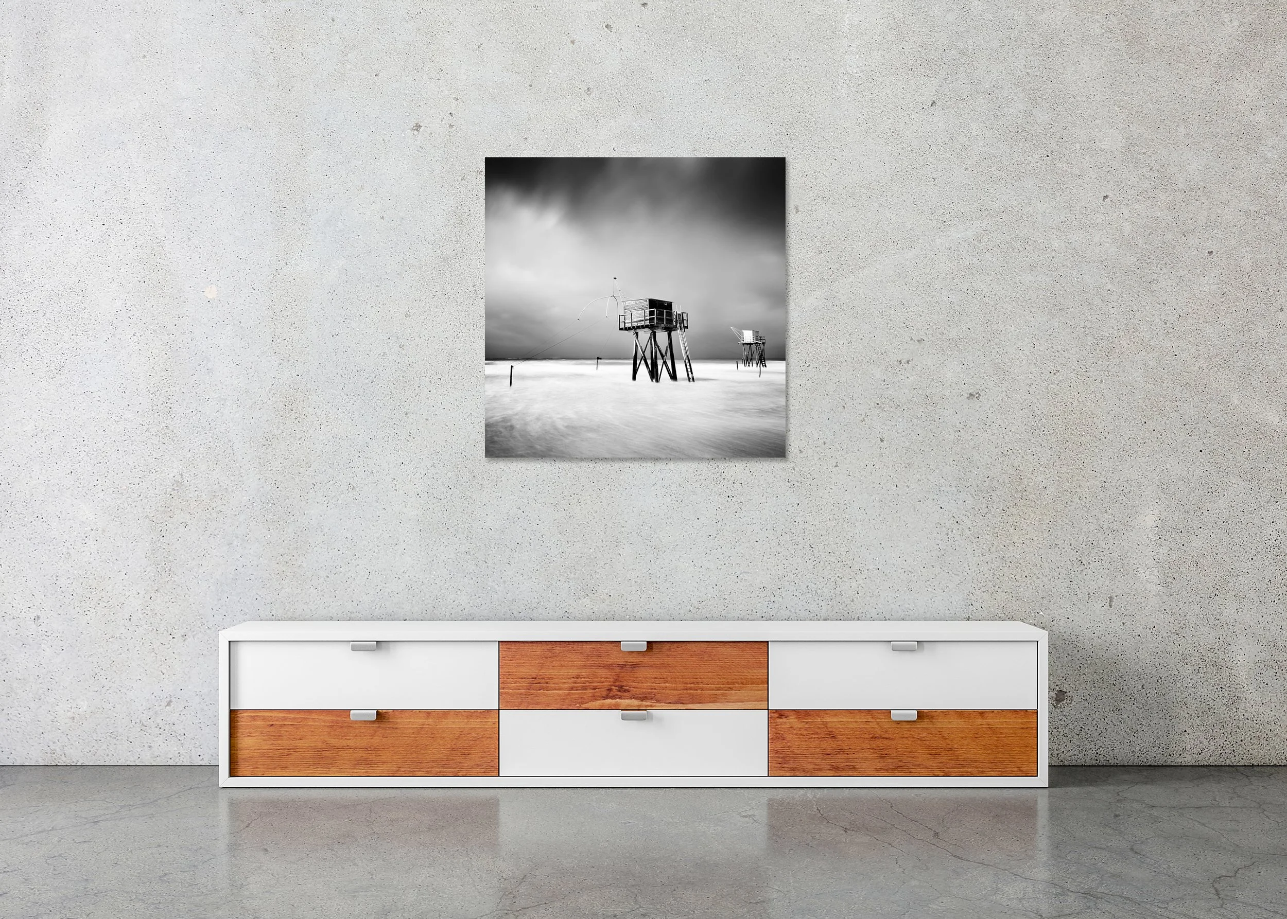 Fishing Hut on Stilts Study 1 displayed in a modern interior as a frameless black-and-white aluminium Dibond print by Gerald Berghammer.