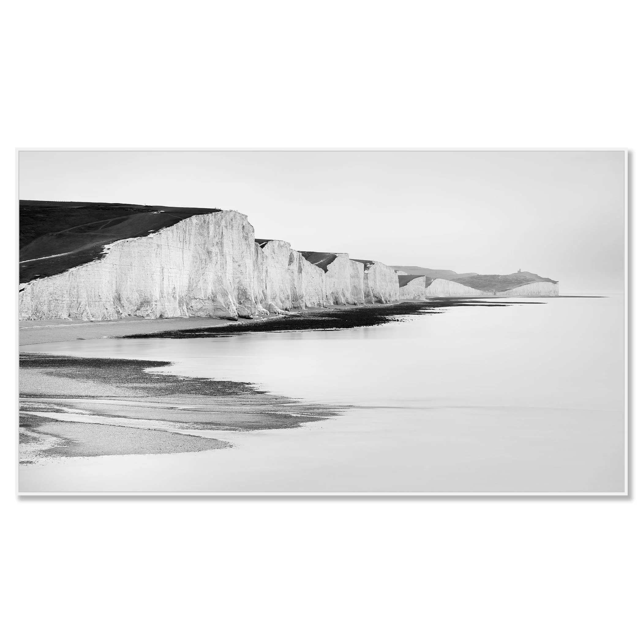 White chalk cliffs on the Sussex coast in England, viewed in black and white from the shoreline – framed ArtBox white