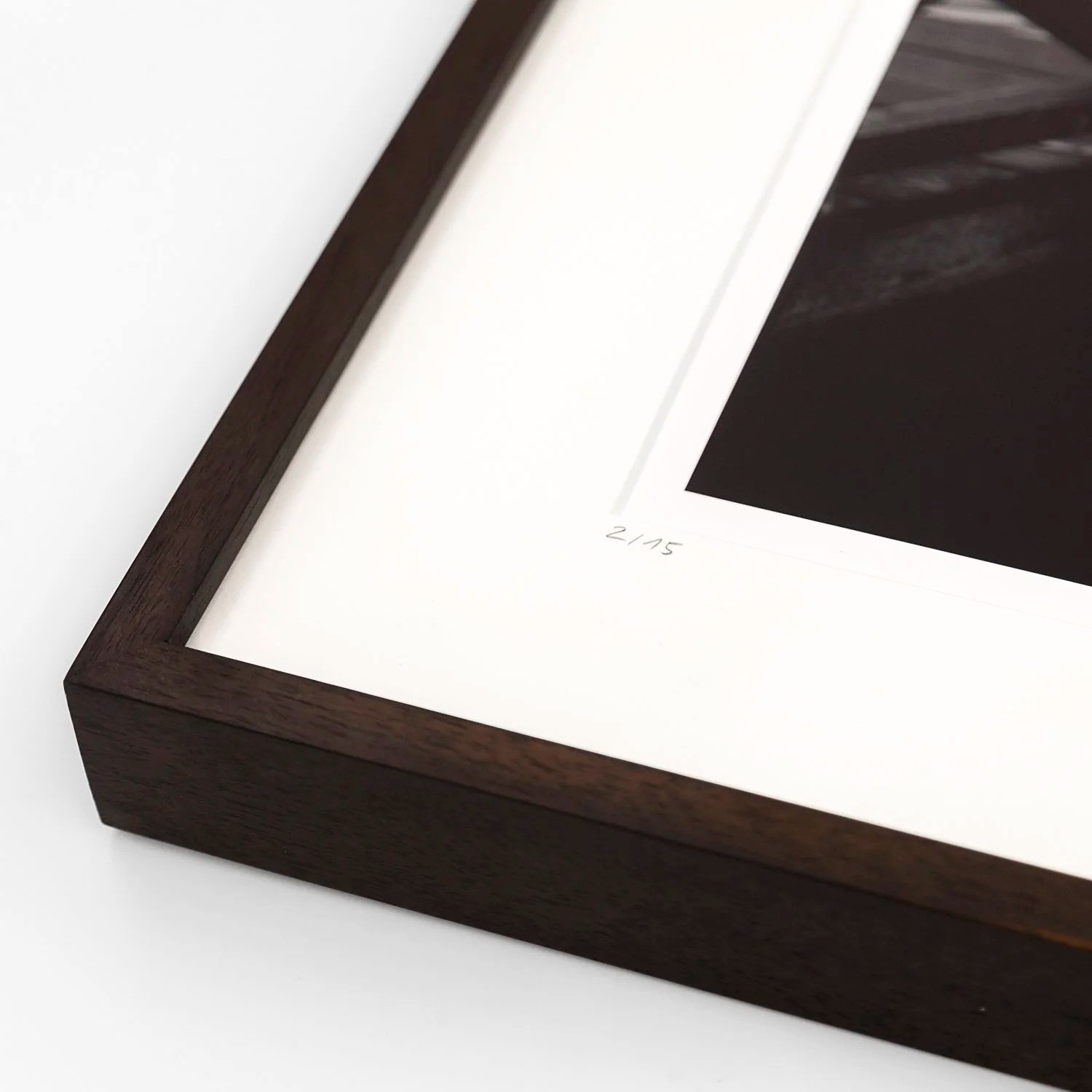 Framing detail of Gondola Study 1 by Gerald Berghammer, showing the handwritten edition number 2/15 and dark-brown wooden frame.
