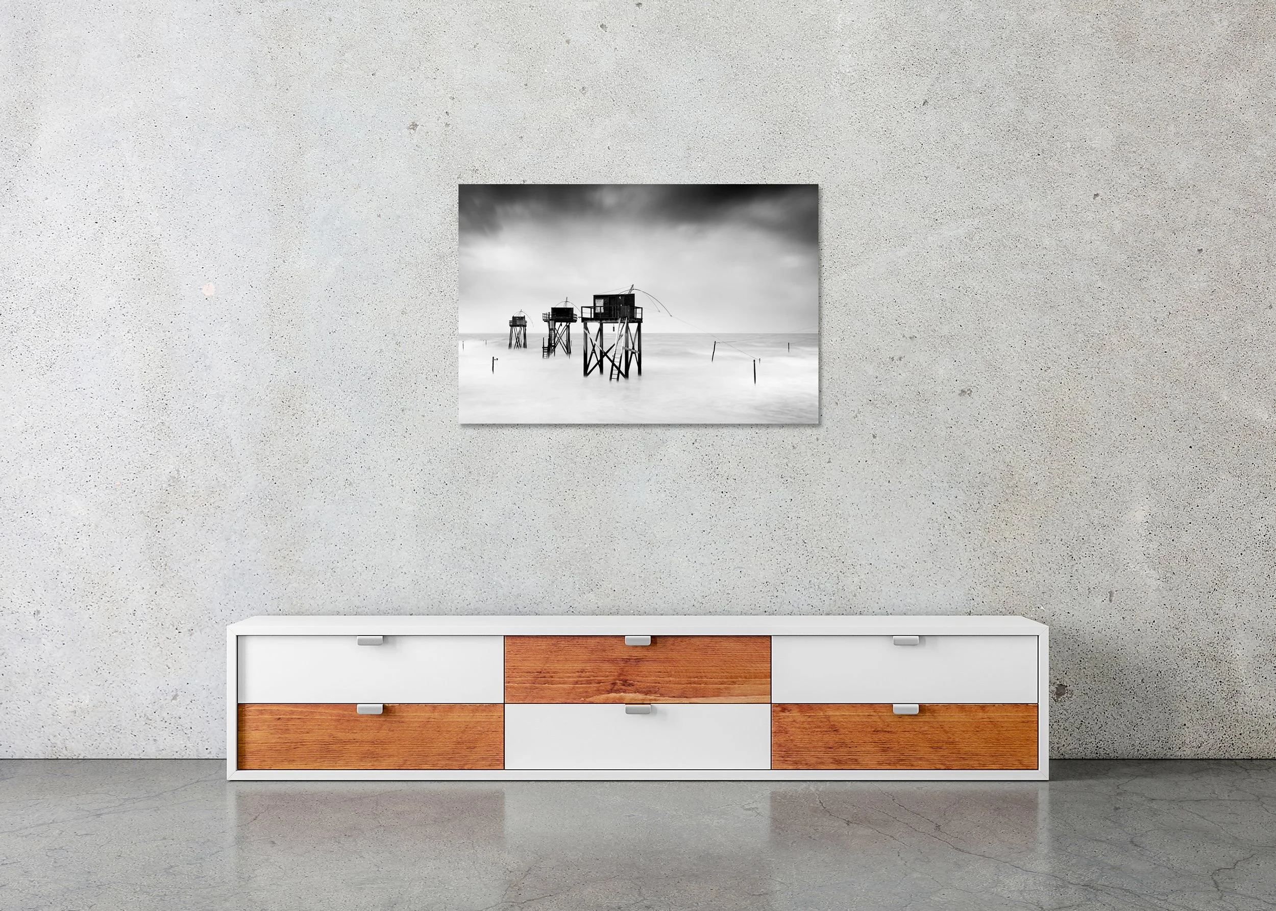 Minimalist monochrome long-exposure seascape with stilted wooden fishing huts and a smooth, misty sea, photo print mounted to Dibond, frameless.