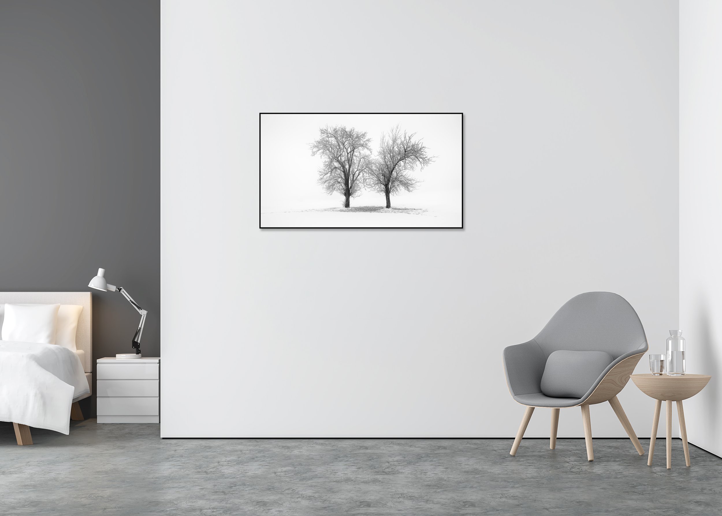 Two leafless trees in a snow-covered Austrian winter landscape, photographed in black and white by Gerald Berghammer.