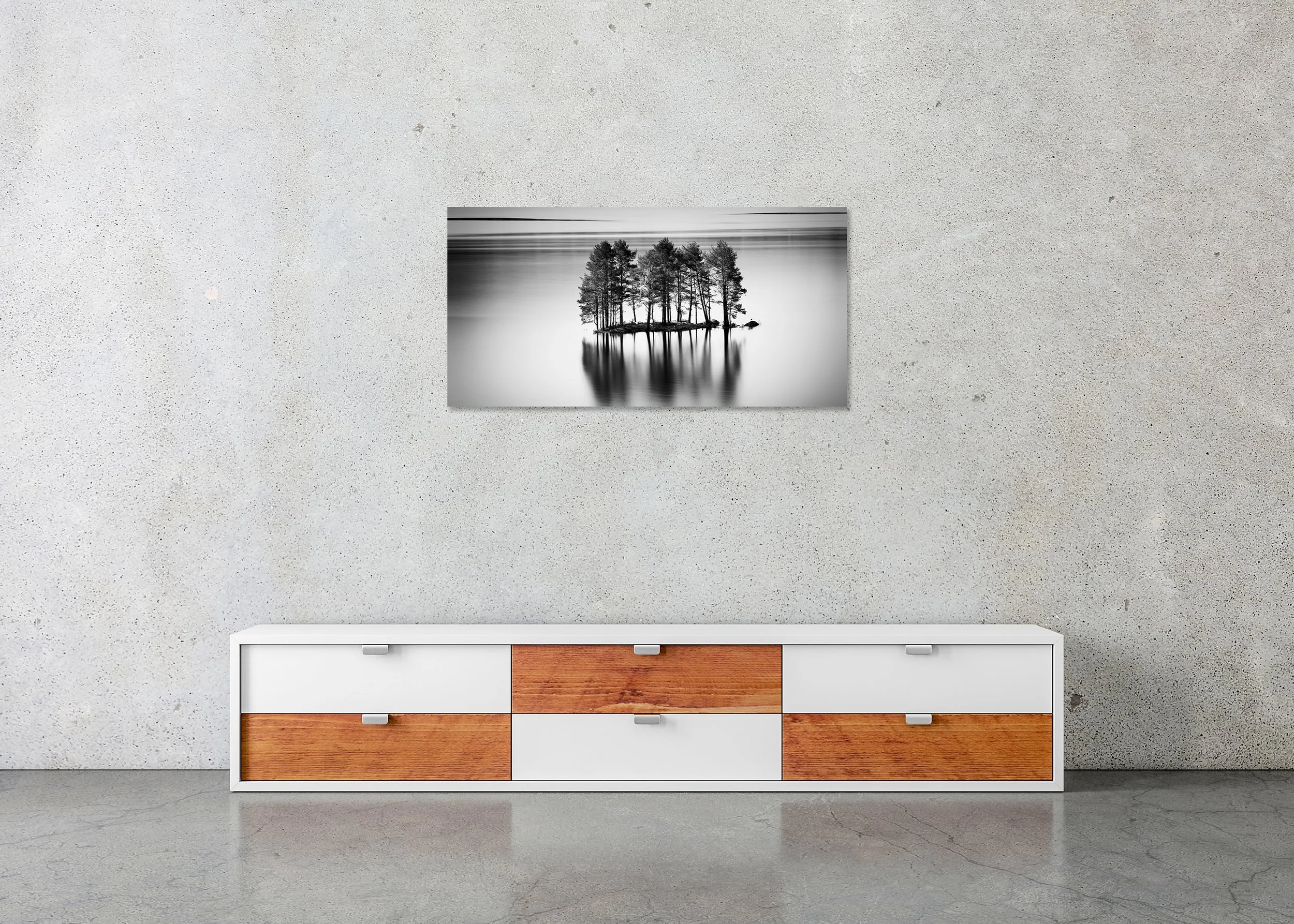 Black and white long exposure photo of trees on a small island reflected in calm water, photo print mounted to Dibond, frameless