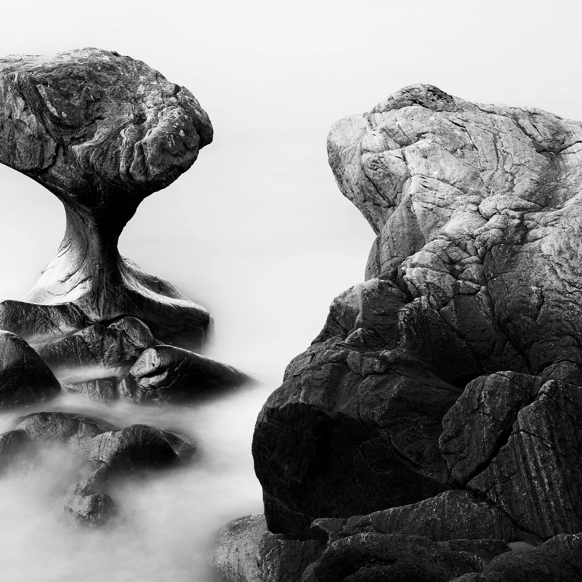 Attracted by the Sea Study 1 by Gerald Berghammer, detail of contrasting rock formations and soft long-exposure water.