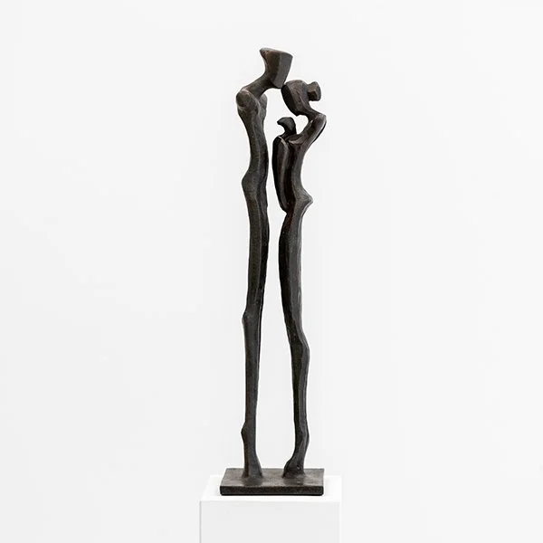 Family II by Nando Kallweit, limited-edition figurative bronze sculpture depicting a stylised family group with elongated geometric forms.