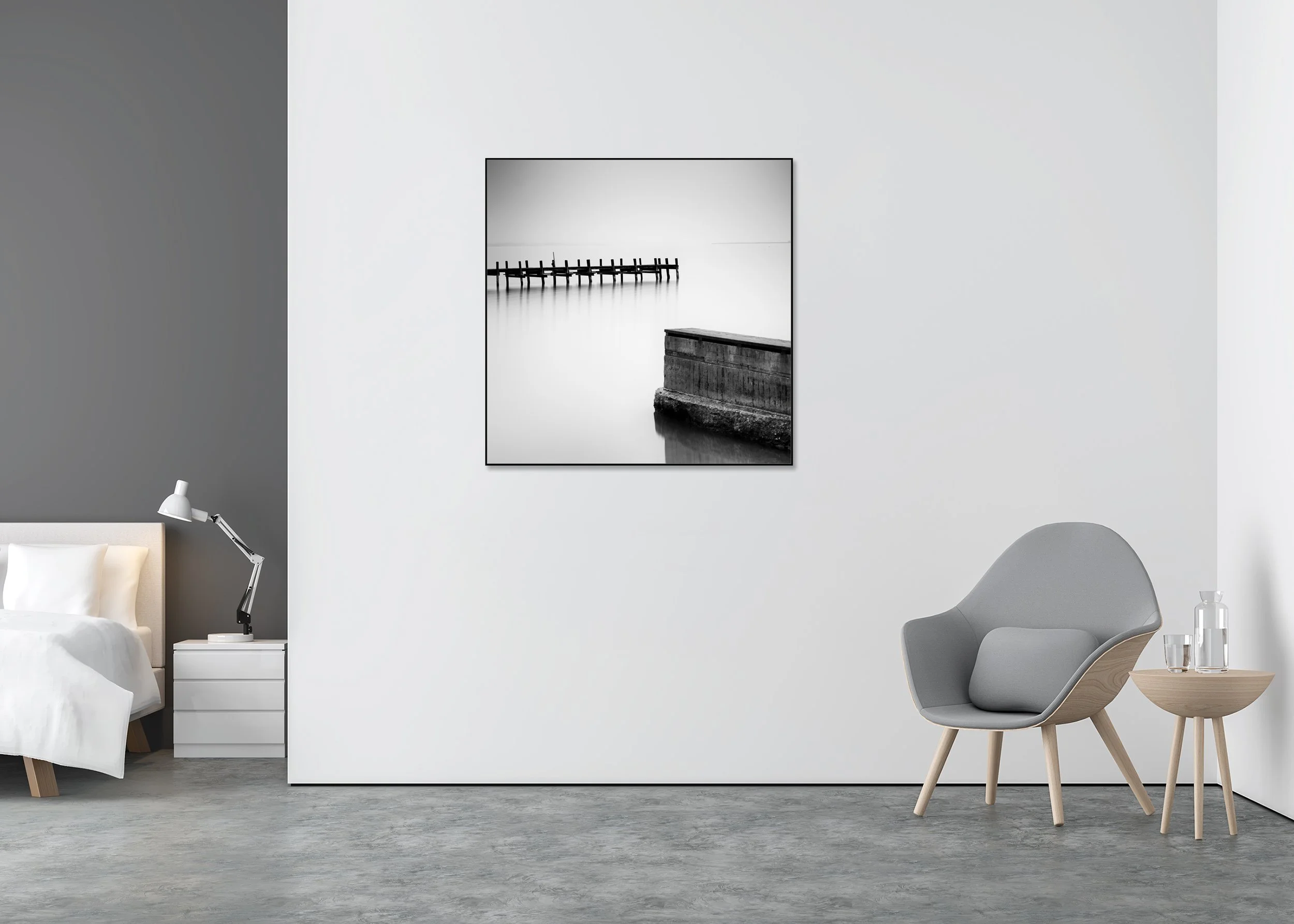 Black and white photo print of an old wooden pier over still water, mounted to Dibond in an aluminium ArtBox frame