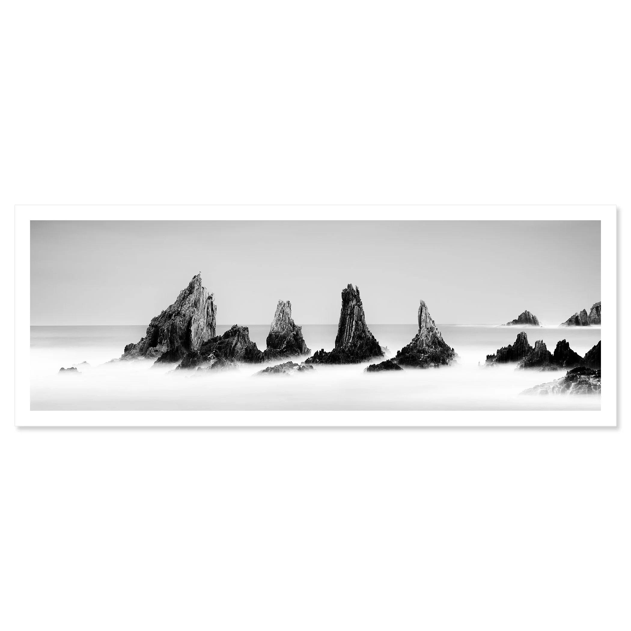 Rocky Peaks, Panorama Study 3 – panoramic black-and-white fine art print of jagged sea stacks on Spain’s Atlantic coast by Gerald Berghammer.