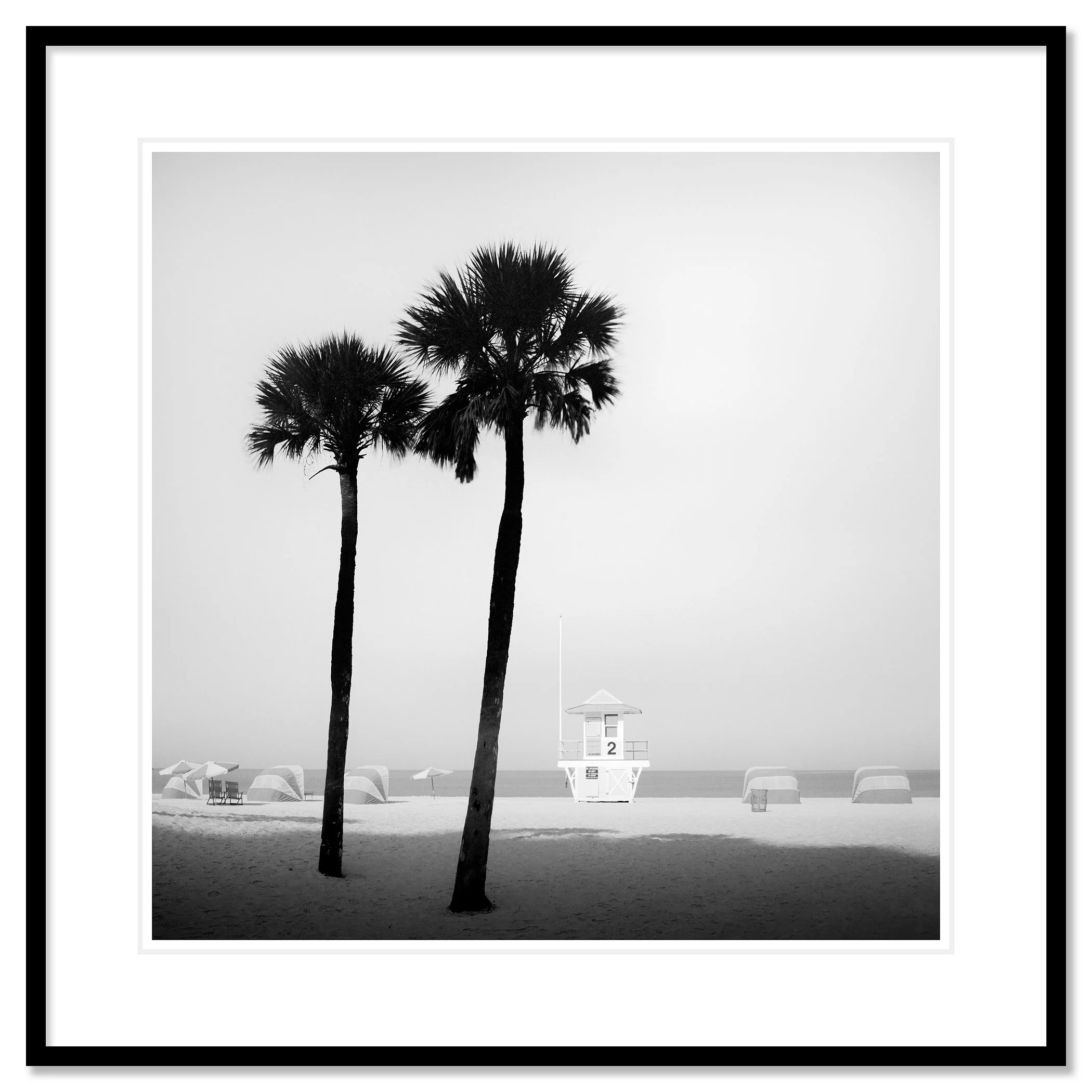 Lifeguard Tower Study 2 shown as an archival pigment print in a black aluminium frame with white mount by Gerald Berghammer.