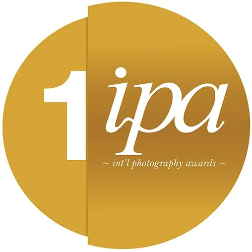 Gold International Photography Awards (IPA) First Place emblem for FARM LAND, awarded to Gerald Berghammer and Ina Forstinger in 2015.