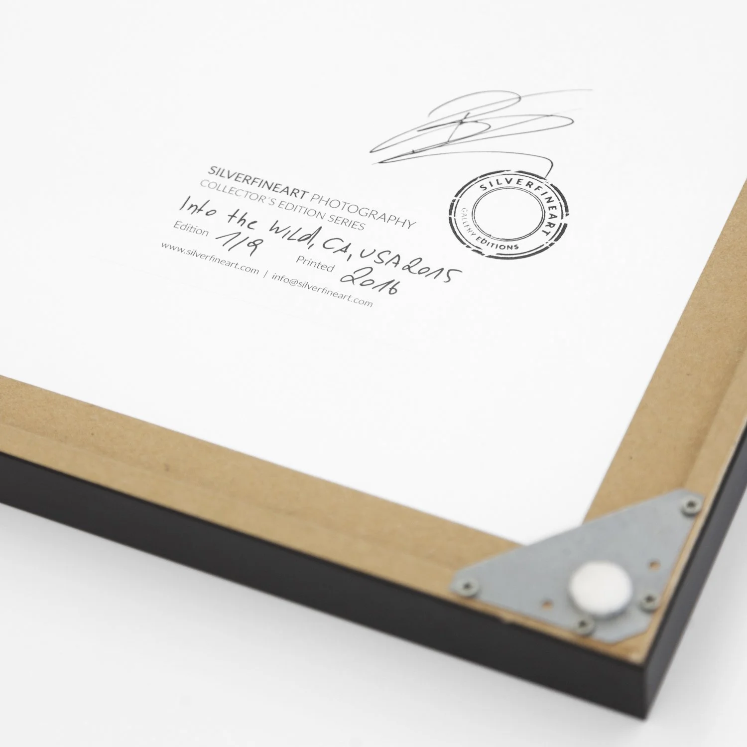 Reverse of Into the Wild by Gerald Berghammer, showing the artist's signature, SILVERFINEART stamp and handwritten edition details.