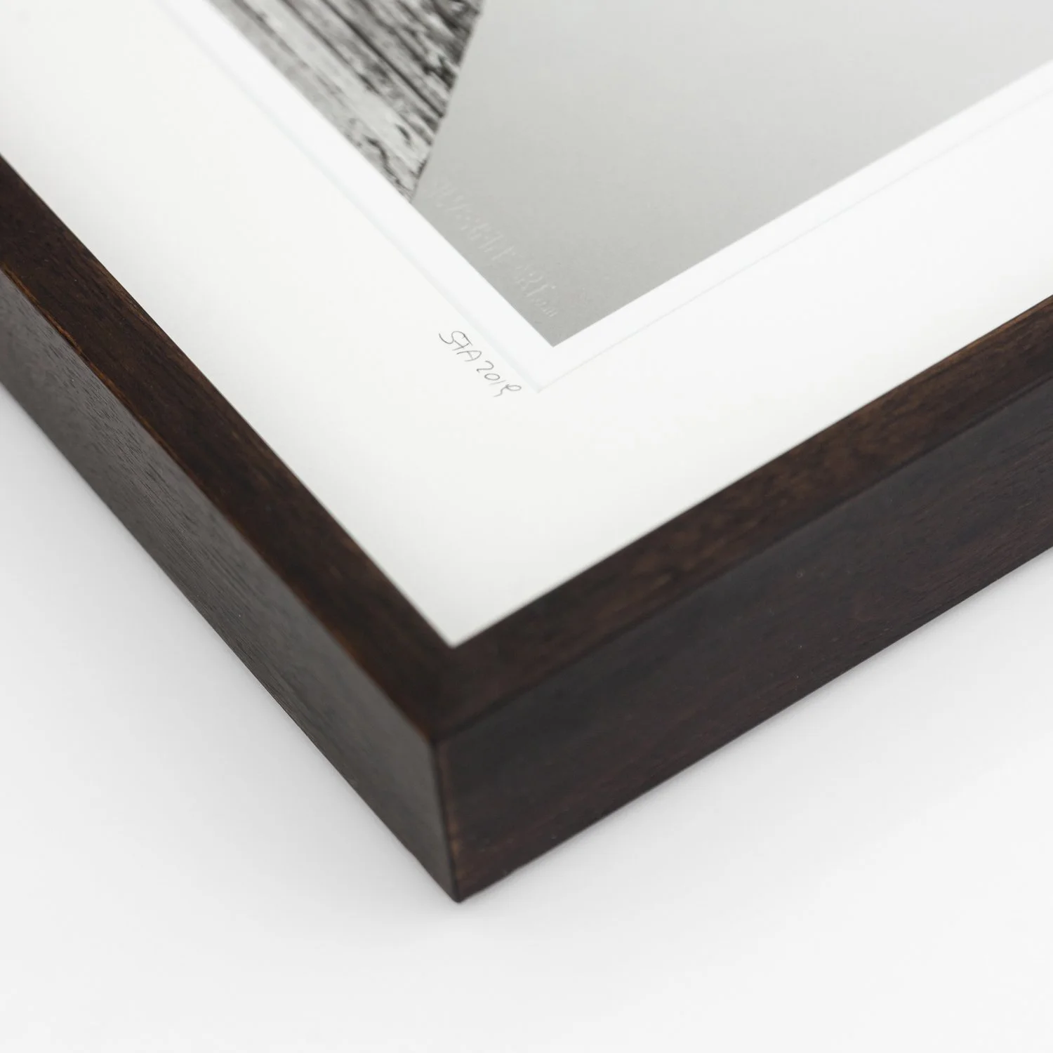 Detail of the dark-brown wooden frame and handwritten date on Self Portrait Study 2 by Gerald Berghammer