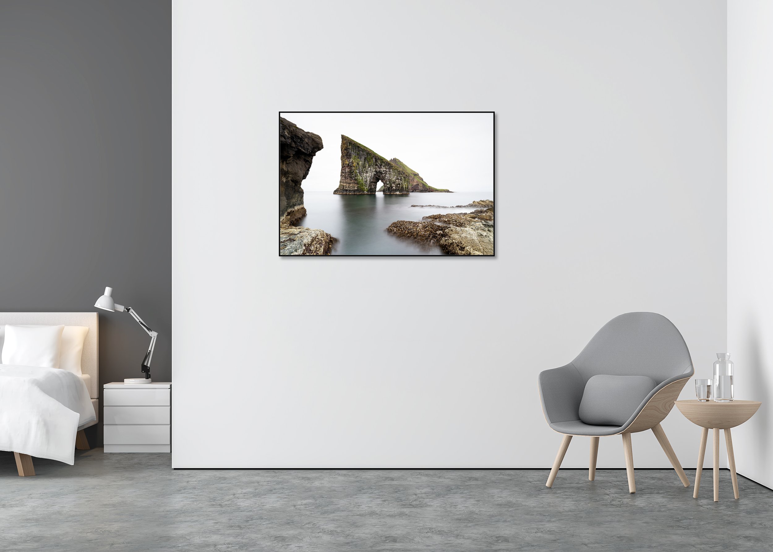 Drangarnir Sea Arch, Study 1 – colour Dibond print in a black aluminium ArtBox displayed in a minimalist bedroom.