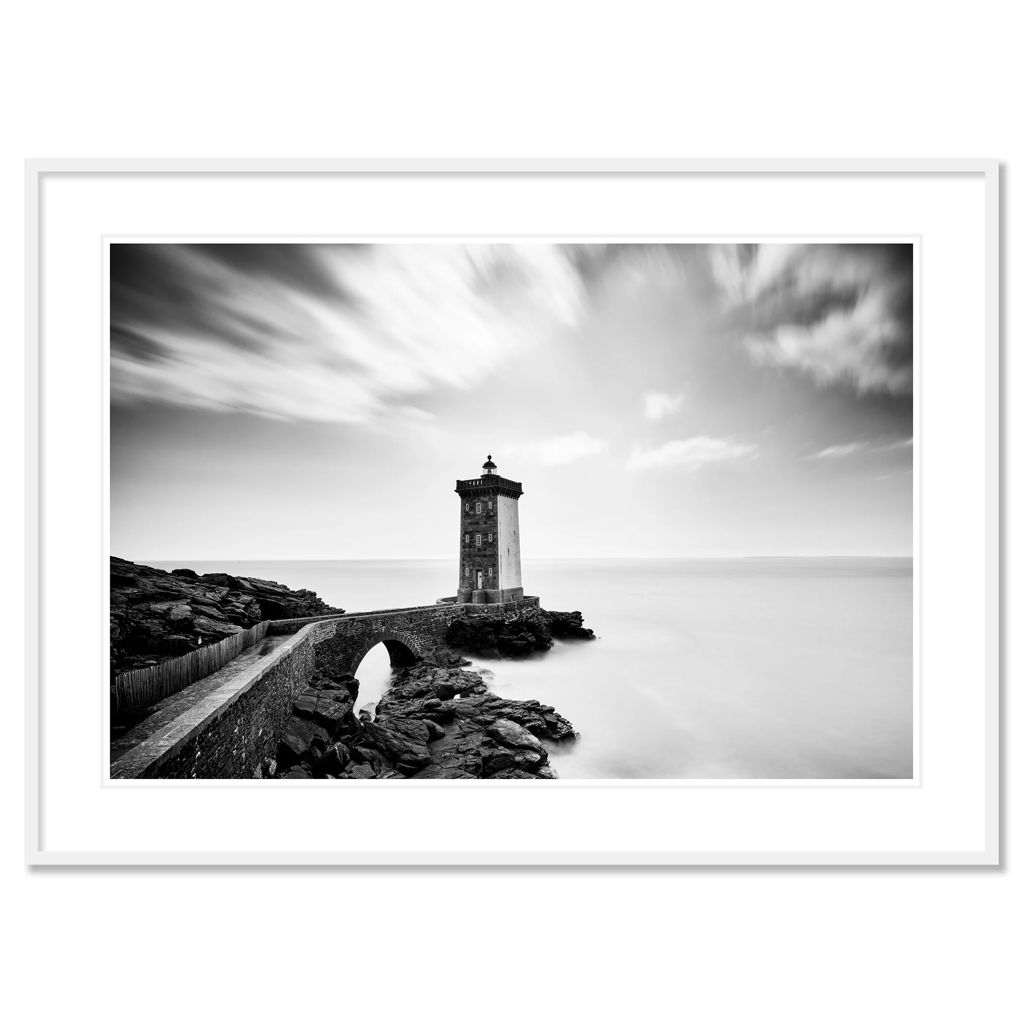 Black-and-white coastal lighthouse with stone bridge across rocks and overcast sky, Classic frame white