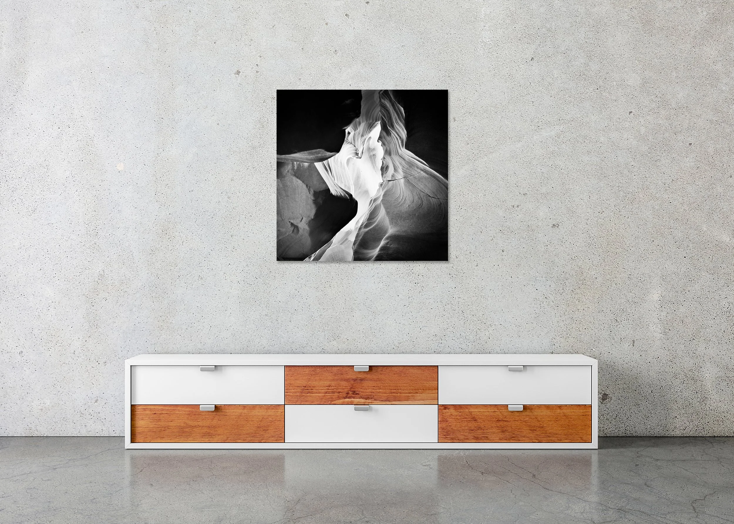 Antelope Canyon Study 9 displayed in a modern interior as a frameless black-and-white artwork mounted on aluminium Dibond by Gerald Berghammer.
