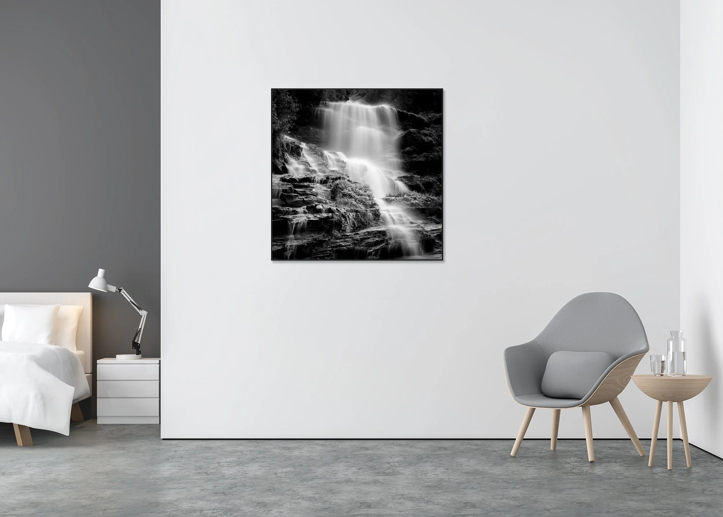 Klockelefall Waterfall Study 2 displayed in a modern interior as a black-and-white Dibond print in a black aluminium ArtBox frame by Gerald Berghammer.