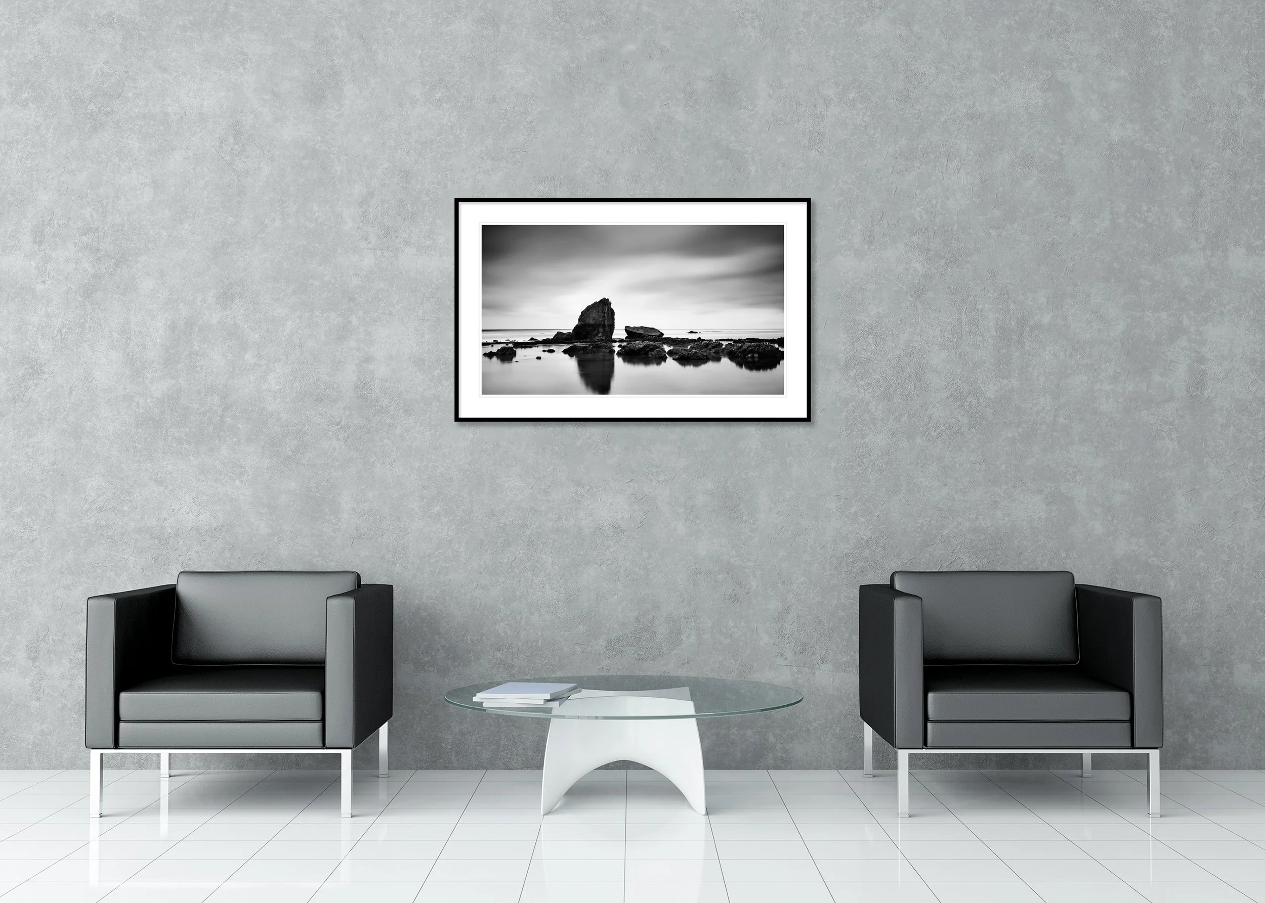 Beach Rock Panorama Study 2 – France by Gerald Berghammer, black-and-white fine art photograph displayed in a contemporary interior in a black aluminium frame with white mount