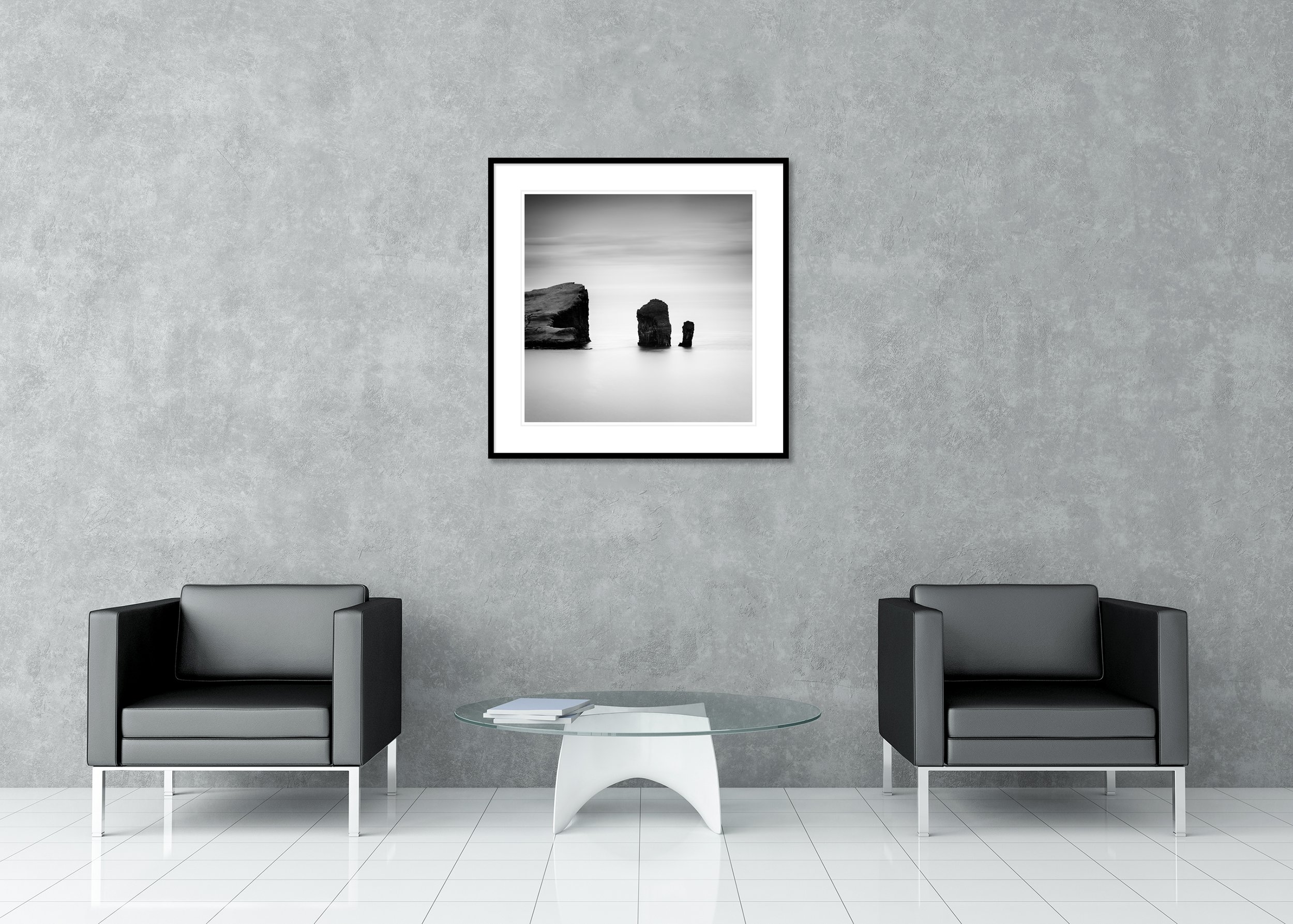 North Atlantic Basalt Study 1 displayed in a modern interior as an archival pigment print in a black aluminium frame with a white mount by Gerald Berghammer.