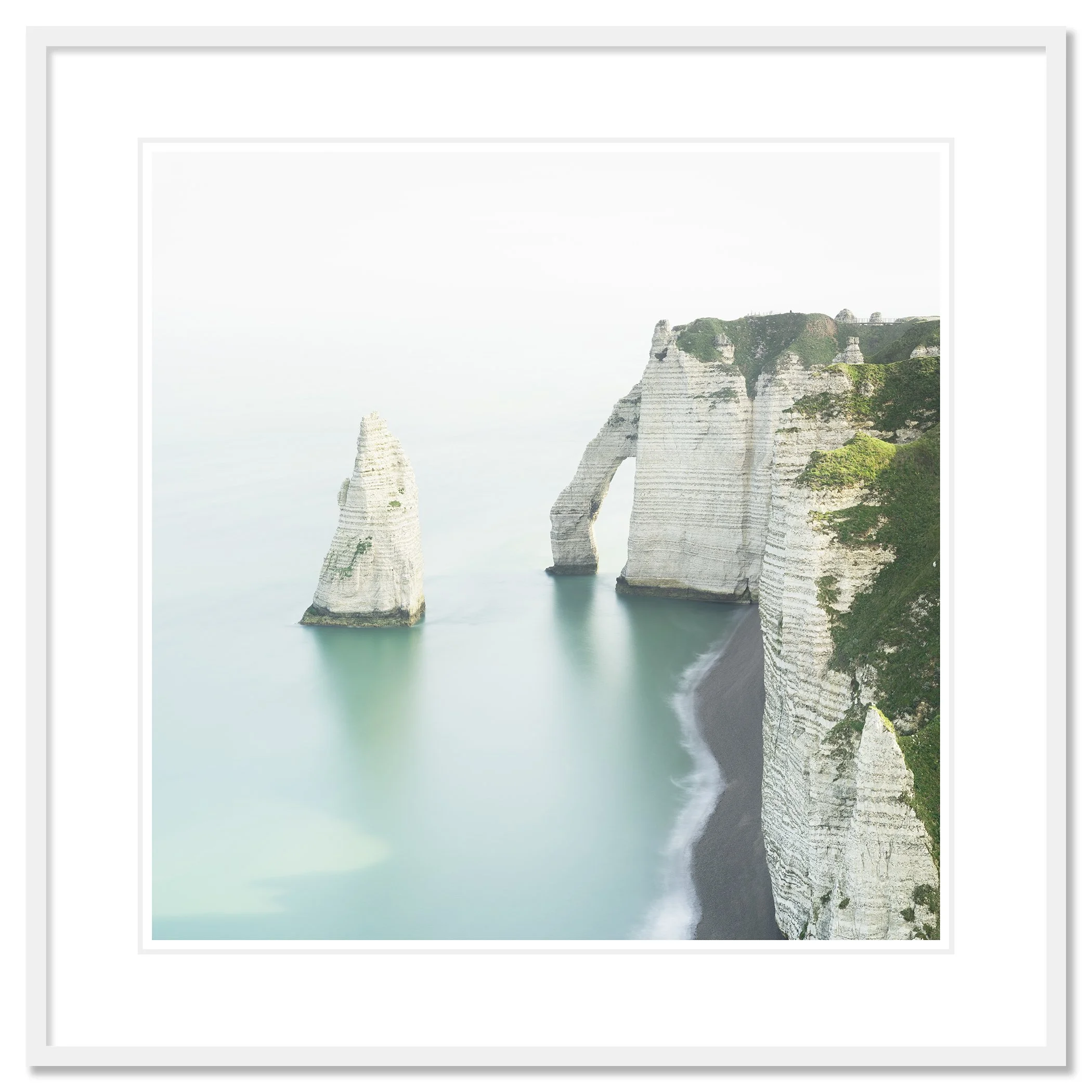 Archival pigment print of The White Cliffs of Étretat in a white aluminium frame with white mount