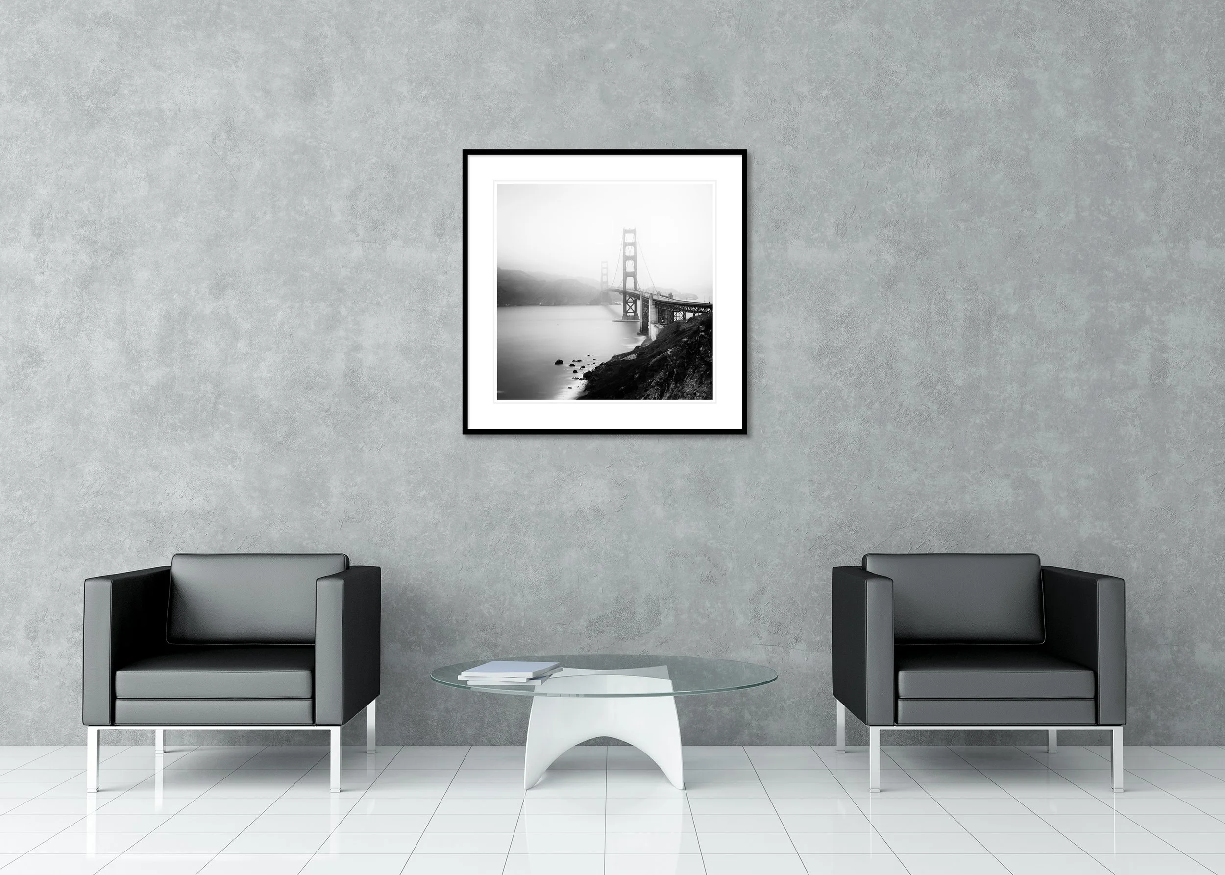 Misty monochrome view of the Golden Gate Bridge with coastline and calm water, archival pigment print in a classic frame with a mount