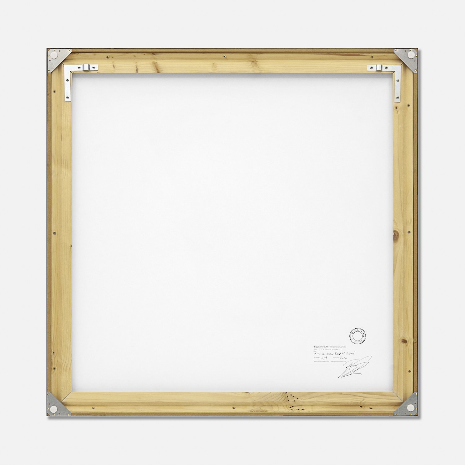 Reverse of the framed Trees in a Snowy Field, Study 2 by Gerald Berghammer, showing the wooden frame and artist's label.