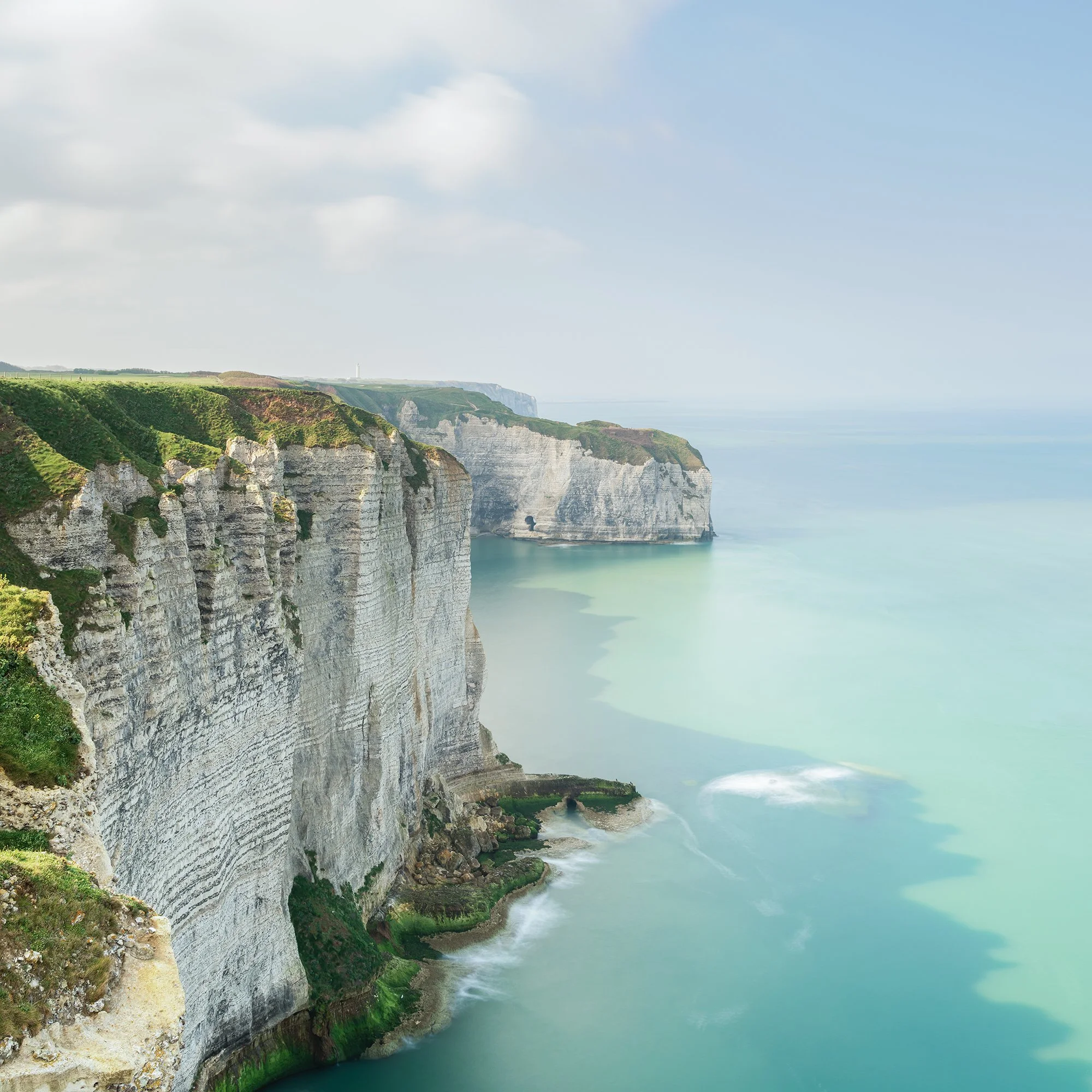 Cropped detail of White Cliffs of Étretat Study 2 showing layered chalk cliffs and luminous turquoise sea.